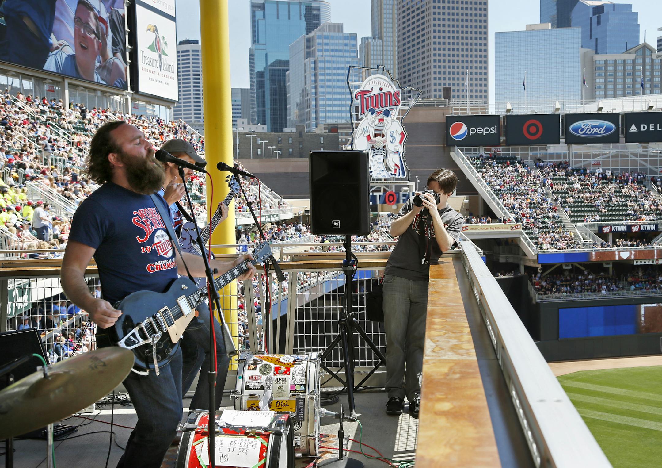 The Twins are featuring local bands in a big way this season. Here, 4onthefloor performs from the 3rd deck during the Twins White Sox game Wednesday afternoon. ] Minnesota Twins -vs- Chicago White Sox - Target Field BRIAN PETERSON ‚Ä¢ brianp@startribune.com Minneapolis, MN - 05/15/2013