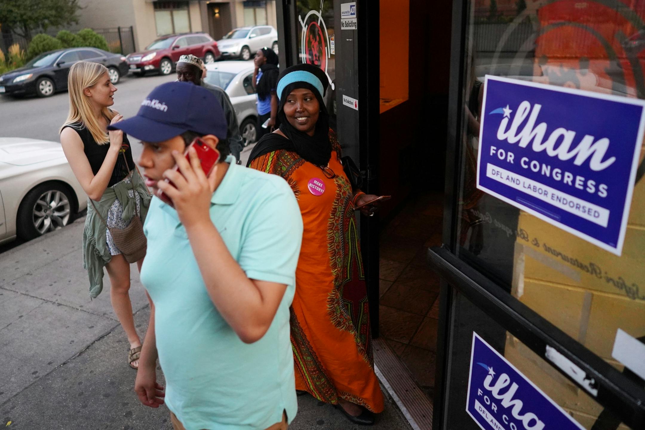 Clara Bartnik (far left) and Hodan Adan (right) made their way into the party as results came in.