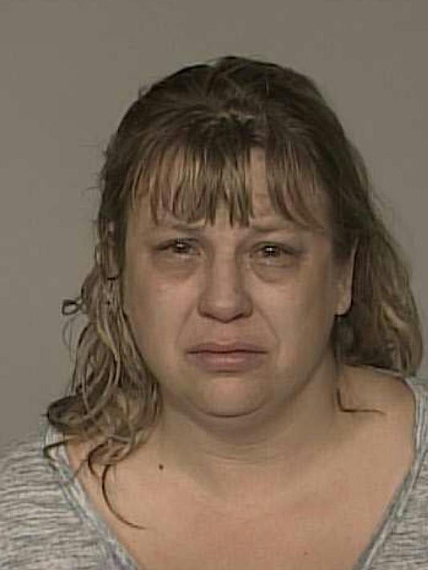 Jodie Burchard-Risch is charged with assaulting another diner in a Coon Rapids restaurant.