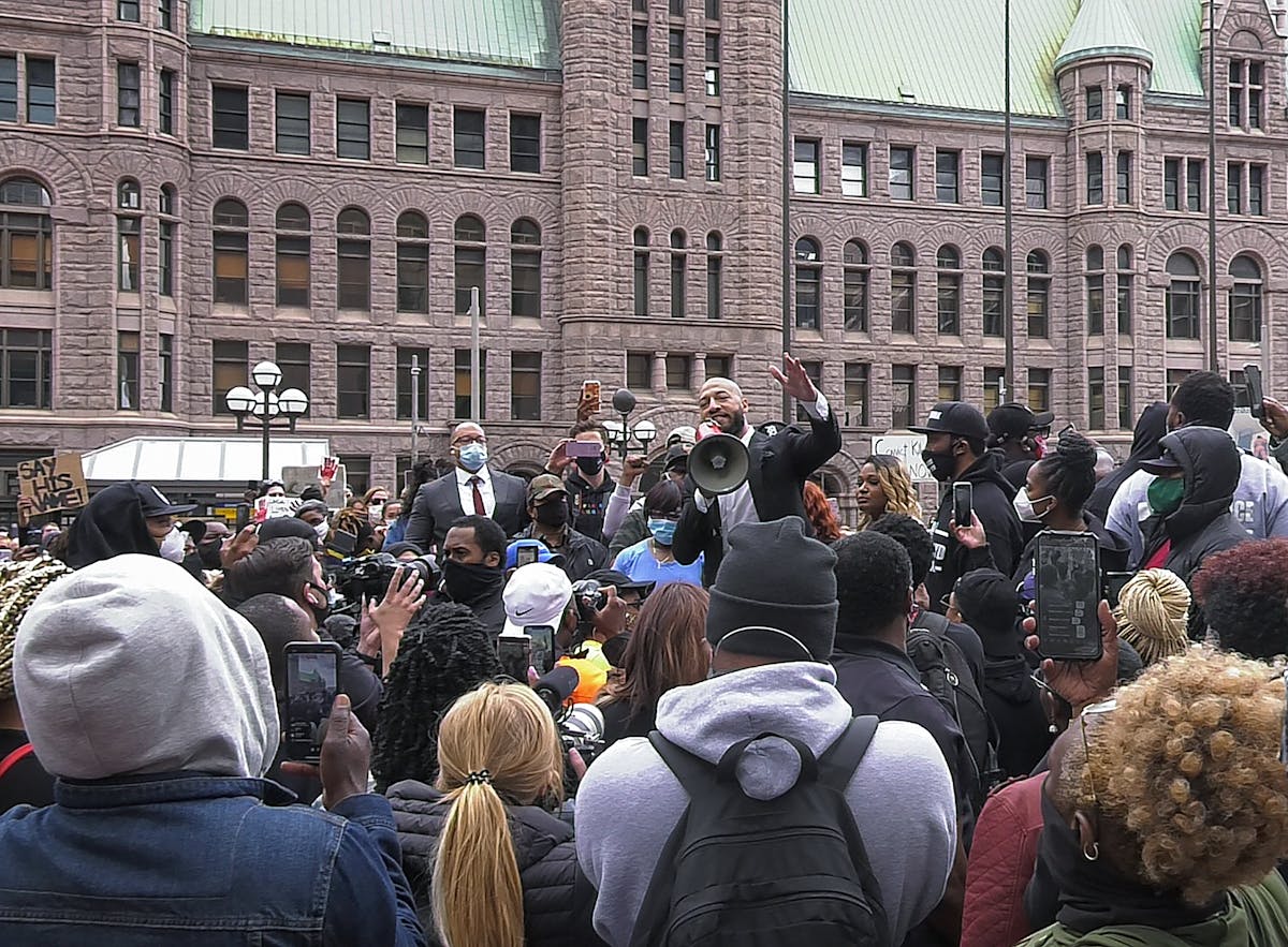 Former Hopkins basketball player Royce White spoke at a rally in downtown Minneapolis on Friday.