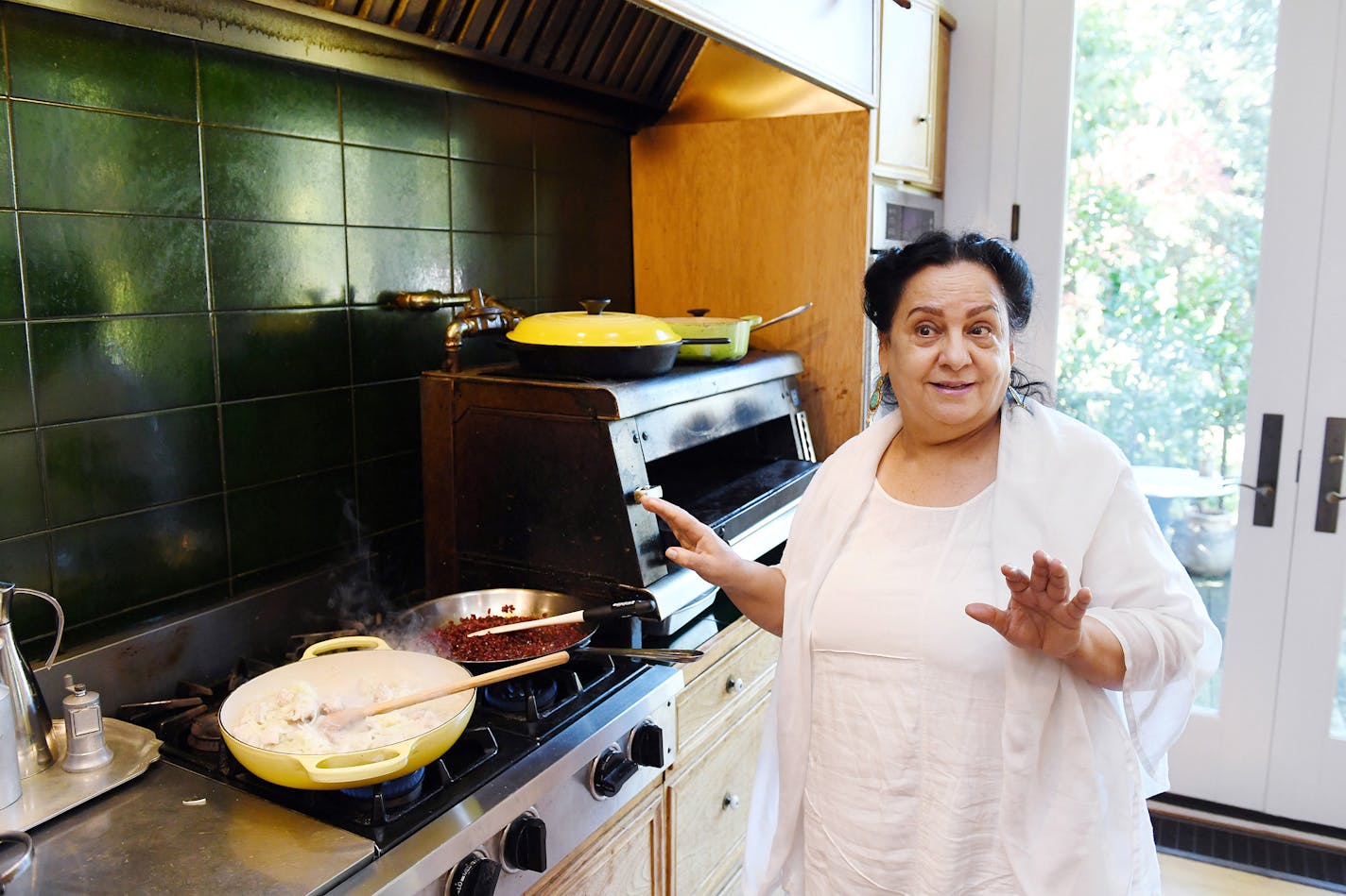 Bajmieh Batmanglij, author of "Cooking in Iran," in her Georgetown kitchen. MUST CREDIT: Washington Post photo by Matt McClain.