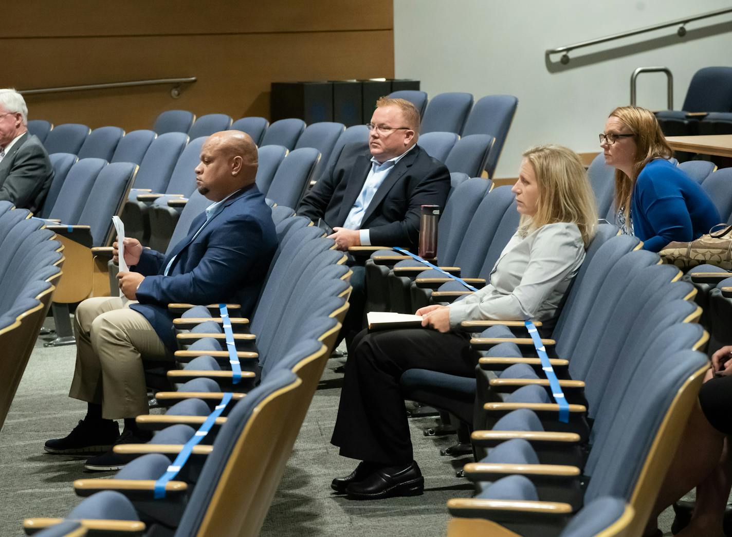 Members of the Minnesota Police and Peace Officers Association waited to speak at the hearing, L to R are Officer Rich Walker, Executive Director Brian Peters, Sergeant Anna Hedberg and Sergeant Sherral Schmidt. ] GLEN STUBBE • glen.stubbe@startribune.com Wednesday, July 15, 2020 Officer Rich Walker, Sergeant Anna Hedberg and Sergeant Sherral Schmidt, of the Minnesota Police and Peace Officers Association and Minneapolis Police Department, spoke before the Senate Public Safety and Finance Commit