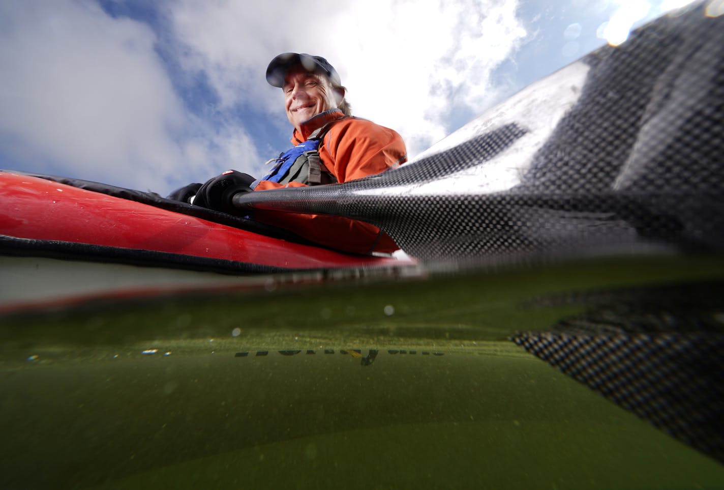 Kayaker Mike Stout floated for a portrait in his boat Thursday at Lake Minnetonka Regional Park. ] ANTHONY SOUFFLE • anthony.souffle@startribune.com Kayaker Mike Stout floated for a portrait Thursday, Sept. 10, 2020 at Lake Minnetonka Regional Park in Minnetrista, Minn. Stout has thought big since he took up sea kayaking in 2016. He just finished his third solo crossing of a Great Lake -- an arduous 16-hour choppy, nighttime push across L. Michigan -- on his way to 1,000 miles in each of the las