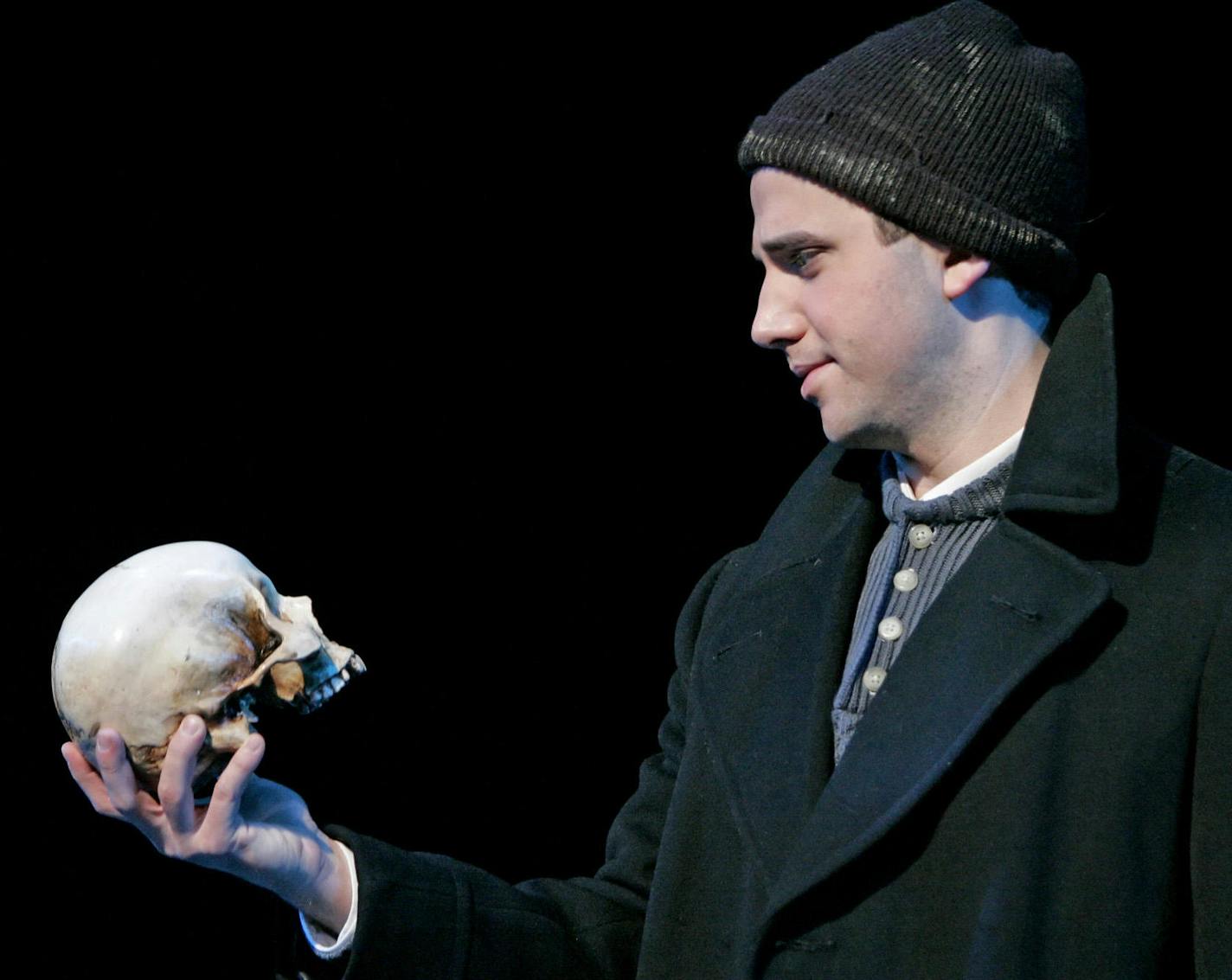 Photo copyright Michal DANIEL, 2006. Santino Fontana as Hamlet in the Guthrie Theater production of Shakespeare&#xcc;s Hamlet, directed by Joe Dowling. Set design by Richard Hoover, costume design by Paul Tazewell, lighting design by Matthew Reinert. March 4 through May 7, 2006.