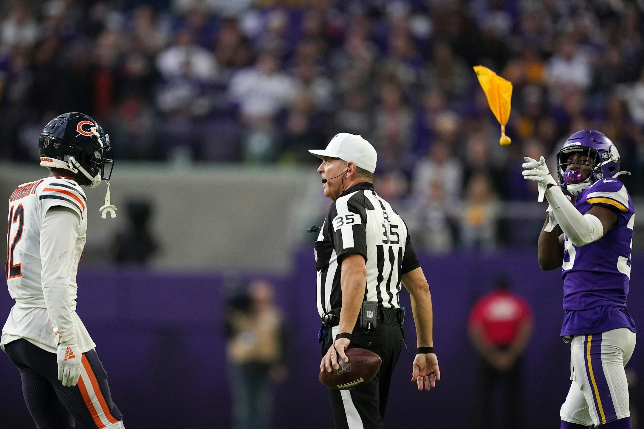 Chicago Bears wide receiver Allen Robinson (12) drew the flag after he tussled with Minnesota Vikings defensive back Kris Boyd (38) following a down in the third quarter.