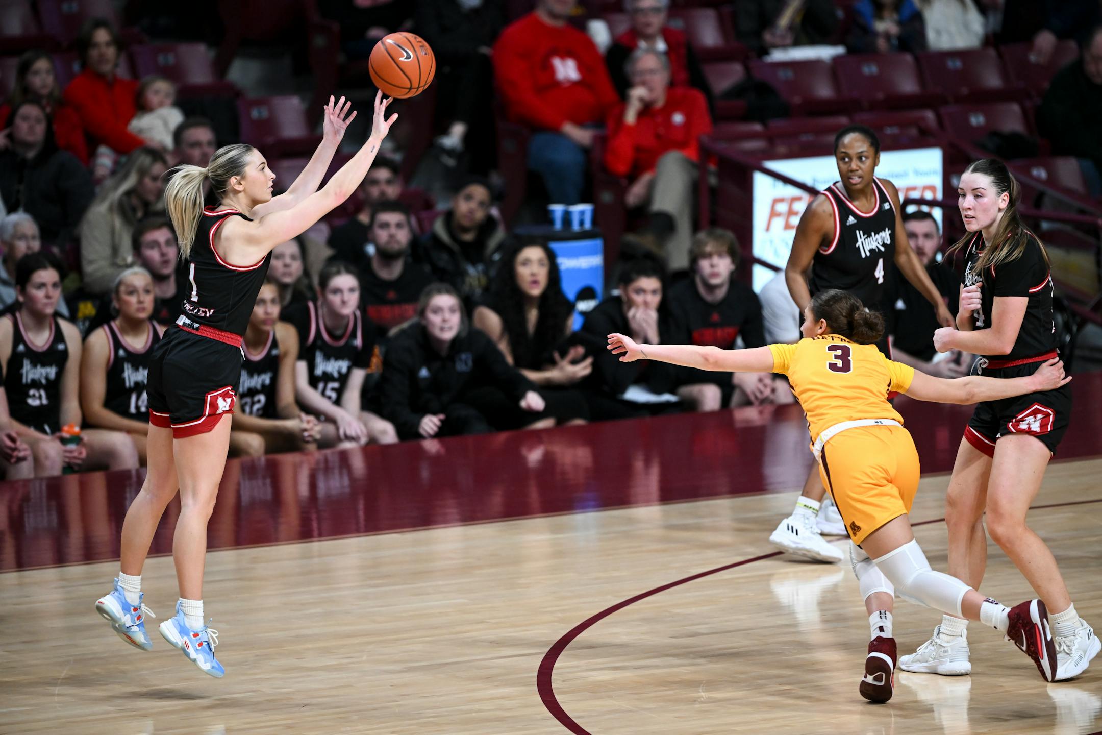 Nebraska guard Jaz Shelley (1) hits a 3-pointer against Minnesota late during the second half.