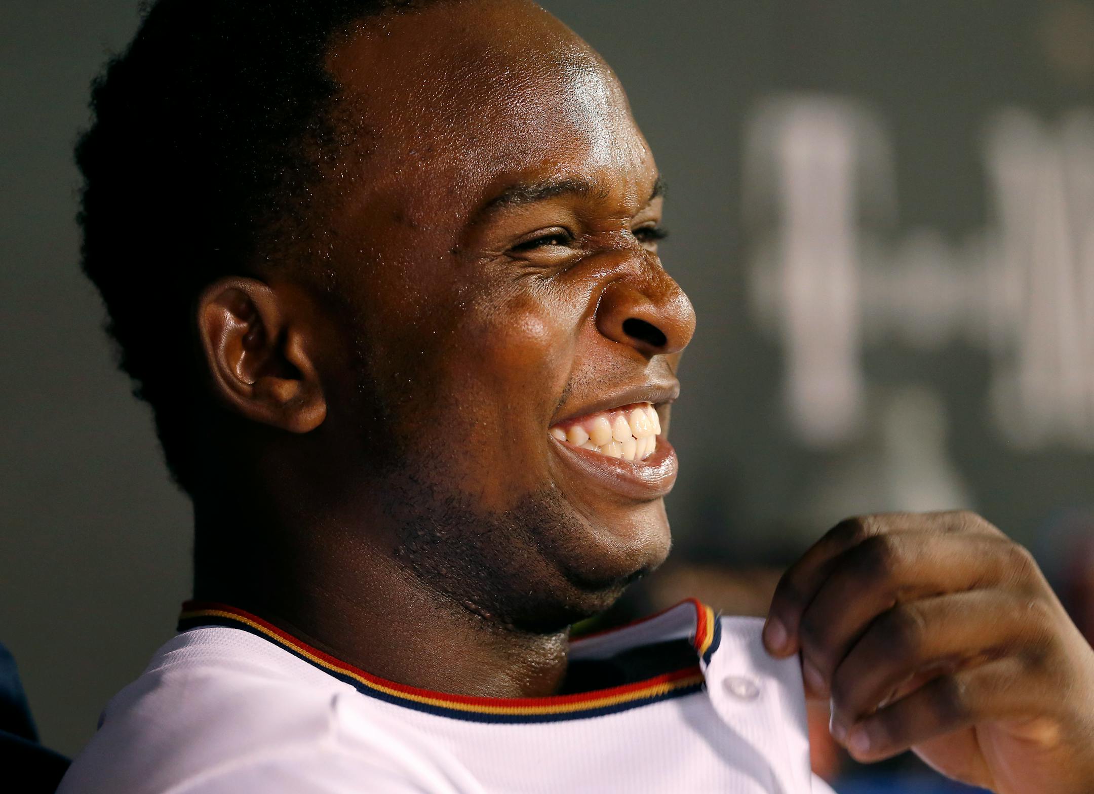 Miguel Sano joked with a teammate in the dugout during the eighth inning of Tuesday's game, in which he hit his first major league home run and had a bases-loaded walk.
