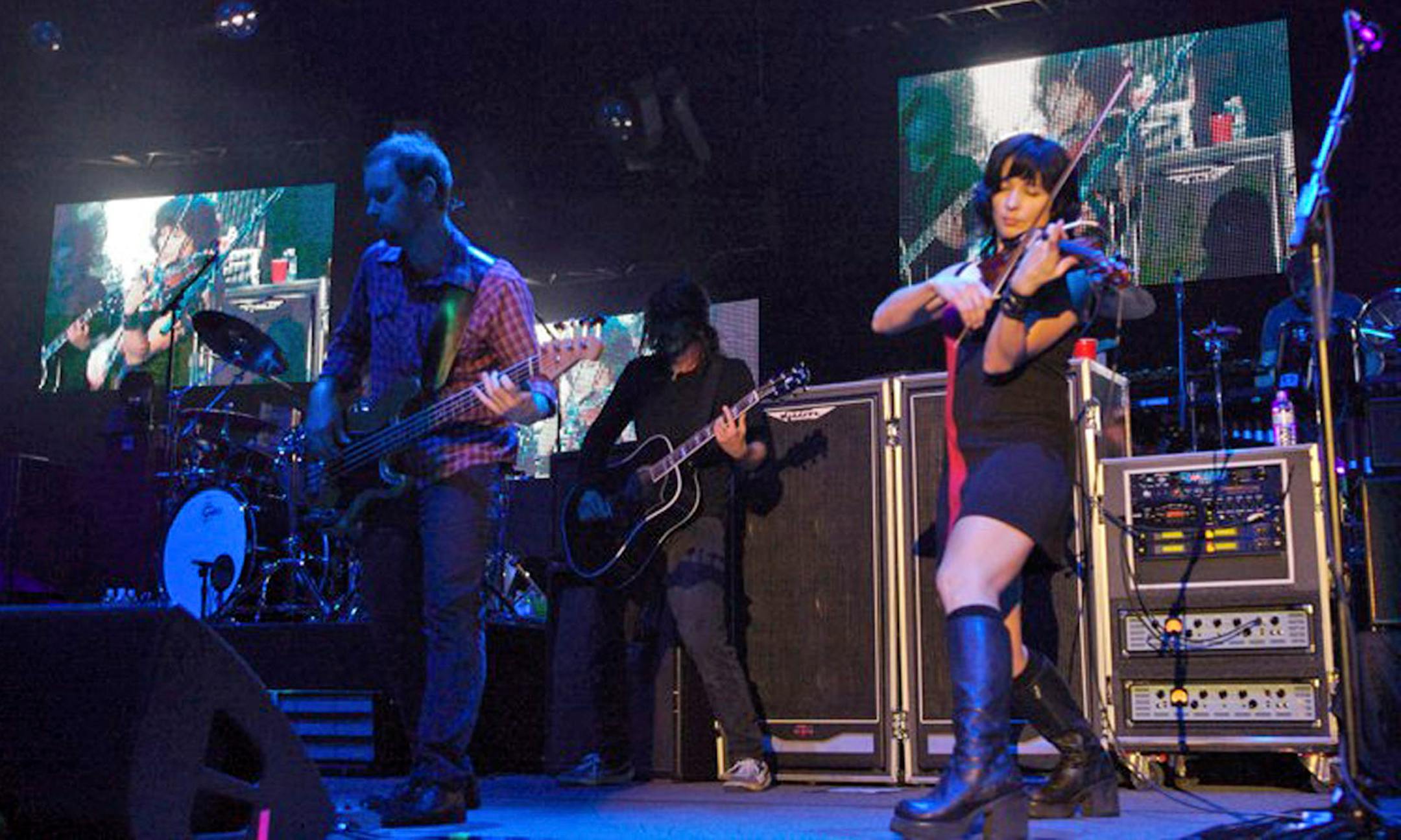 provided photo Jessy Greene performs with the Foo Fighters ( may need higher es file for display) -check with toms / chris r