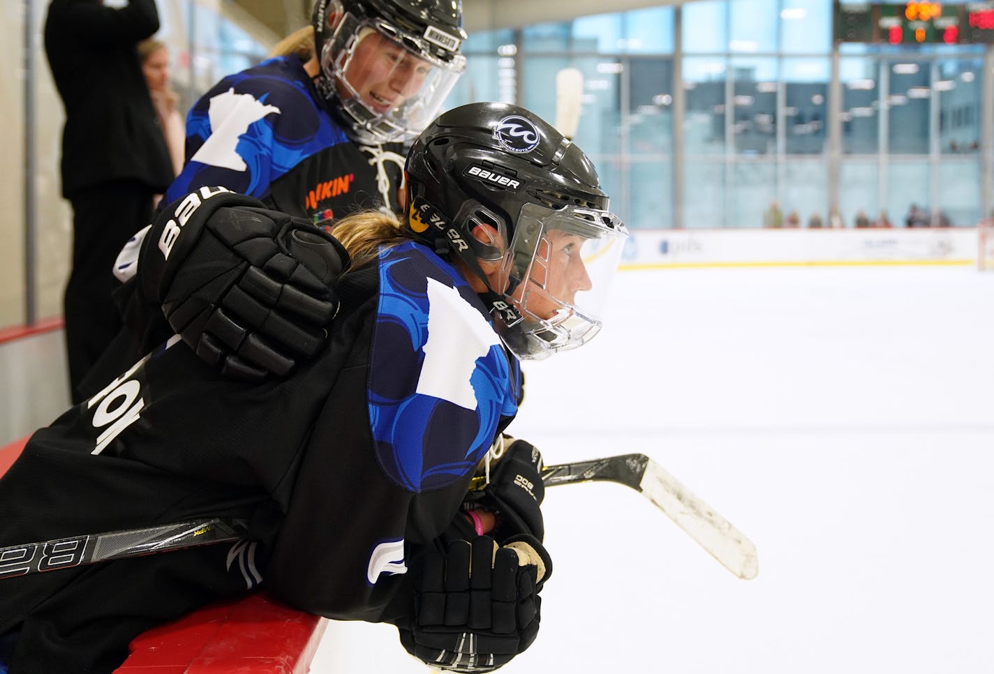 Whitecaps forward Allie Thunstrom (9) was congratulated by her teammates on the bench after she scored a goal during Saturday's game. ] ANTHONY SOUFFLE &#x2022; anthony.souffle@startribune.com Feature game story on Whitecaps opener vs. Metropolitan Riveters Saturday, Oct. 12, 2019 at Tria Rink in St. Paul, Minn. looking at impact of player boycott on the crowd. ORG XMIT: MIN1910121701205292