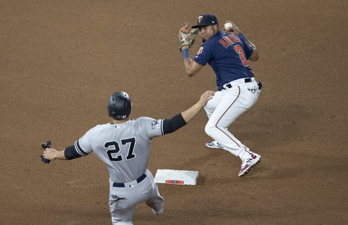 Minnesota Twins second baseman Luis Arraez (2) threw out New York Yankees left fielder Giancarlo Stanton (27) on a double play in the 4th inning during the third game of the ALDS playoffs at Target Field .] Jerry Holt • Jerry.holt@startribune.com The Minnesota Twins hosted the New York Yankees in the third game of the ALDS Monday Oct. 07, 2019. Minneapolis, MN. Jerry Holt