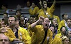 FILE - In this Sept. 16, 2003 file photo, clerks shout in the Euro Dollar Futures pit at the Chicago Mercantile Exchange. Most pits in Chicago and New