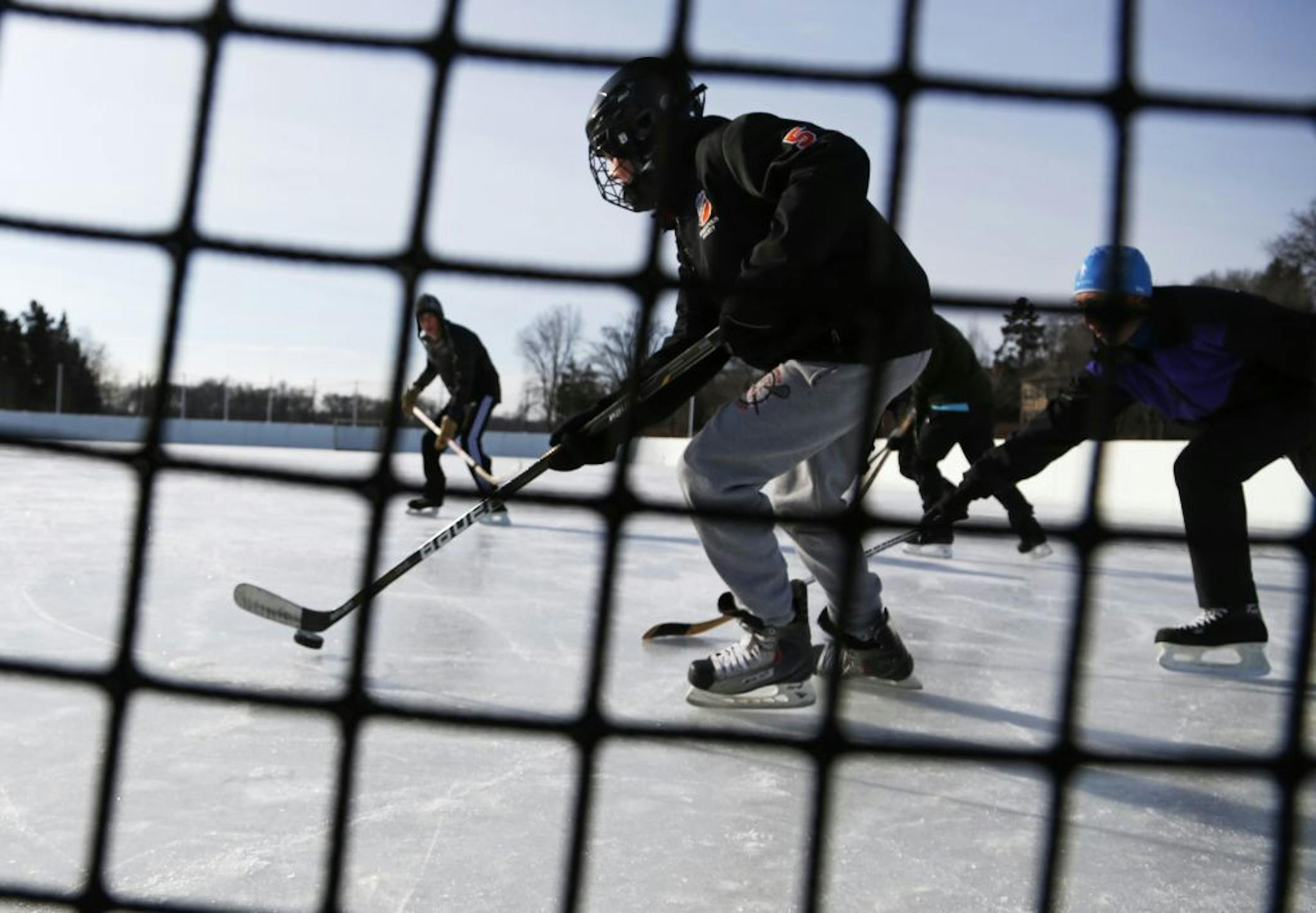 On Lake of the Isles, Eighth-grader Foss Kerker played hockey with his friends from Southwest High School on a bitterly cold Sunday morning.