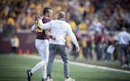 Minnesota's Head Coach P. J. Fleck walked off the field quarterback Conor Rhoda during the third quarter as the Gophers took on Maryland at TCF Bank S