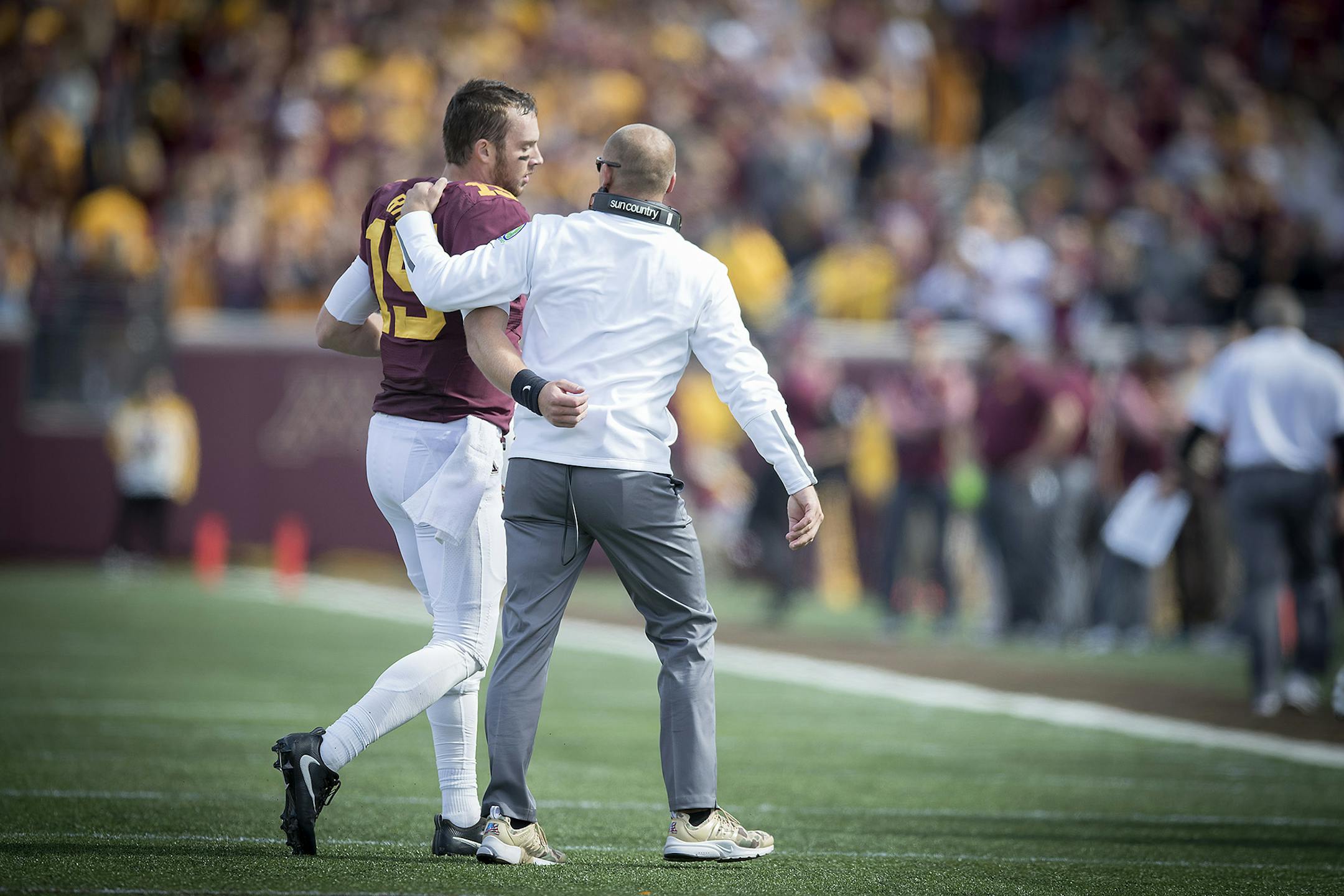 Minnesota's Head Coach P. J. Fleck walked off the field quarterback Conor Rhoda during the third quarter as the Gophers took on Maryland at TCF Bank Stadium, Saturday, September 30, 2017 in Minneapolis, MN. ] ELIZABETH FLORES ï liz.flores@startribune.com
