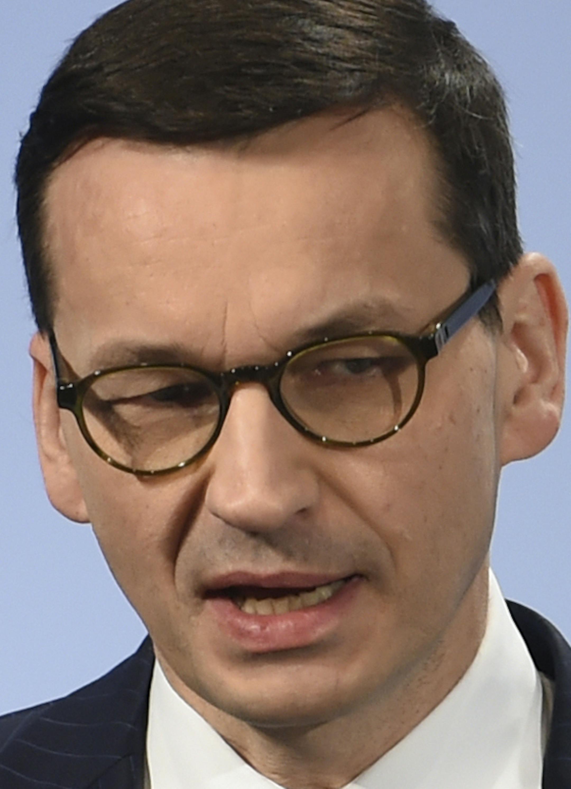 Poland's Prime Minister Mateusz Morawiecki speaks at the Security Conference in Munich, Germany, Saturday, Feb. 17, 2018. (Andreas Gebert/dpa via AP)