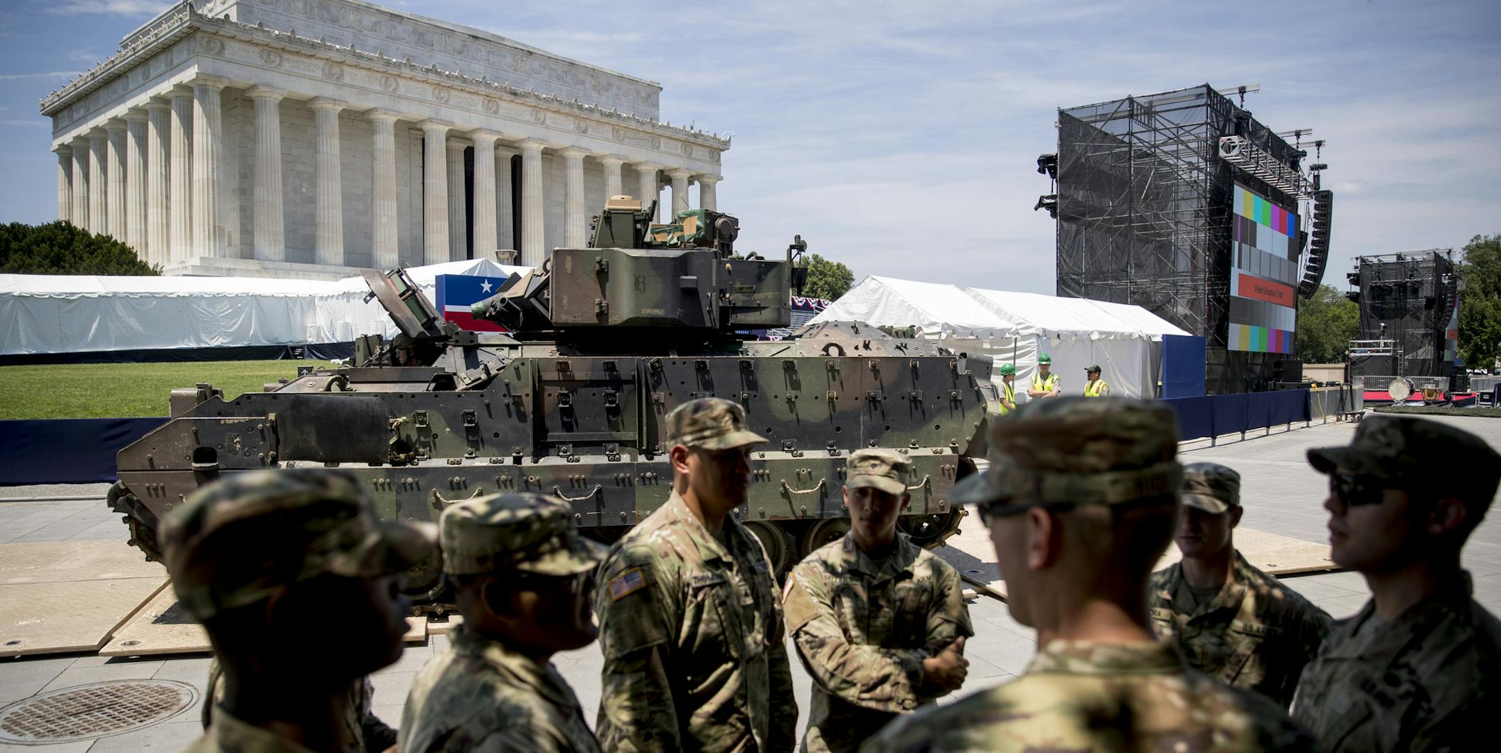 One of two Bradley Fighting Vehicles driven into place in front of the Lincoln Memorial for President Donald Trump's 'Salute to America' event honoring service branches on Independence Day, Tuesday, July 2, 2019, in Washington. President Donald Trump is promising military tanks along with "Incredible Flyovers & biggest ever Fireworks!" for the Fourth of July. (AP Photo/Andrew Harnik)
