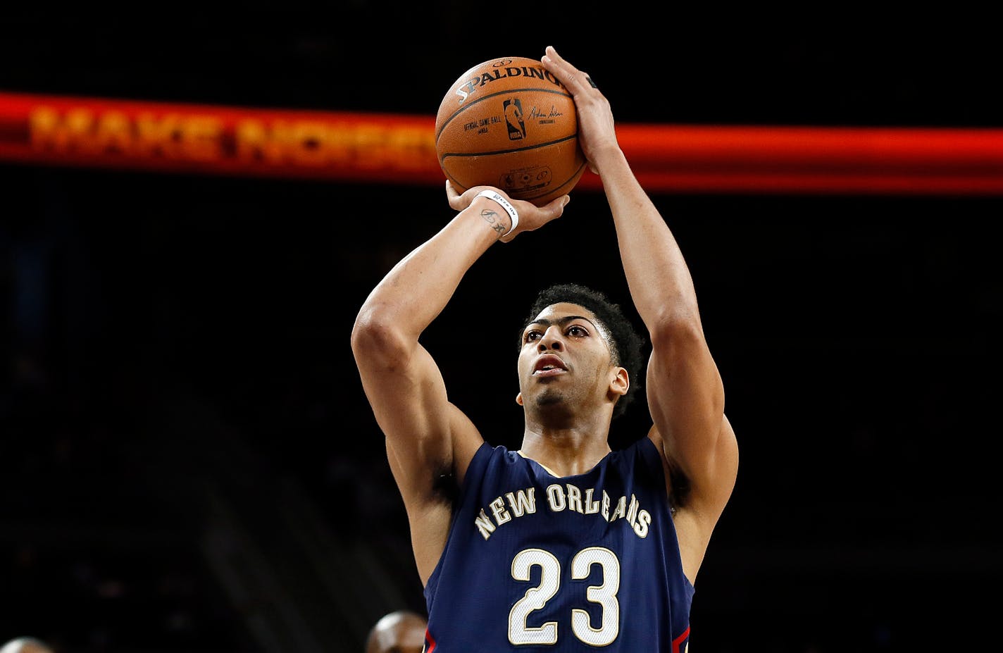 New Orleans Pelicans forward Anthony Davis (23) shoots against the Detroit Pistons in the second half of an NBA basketball game in Auburn Hills, Mich., Wednesday, Jan. 14, 2015. (AP Photo/Paul Sancya)