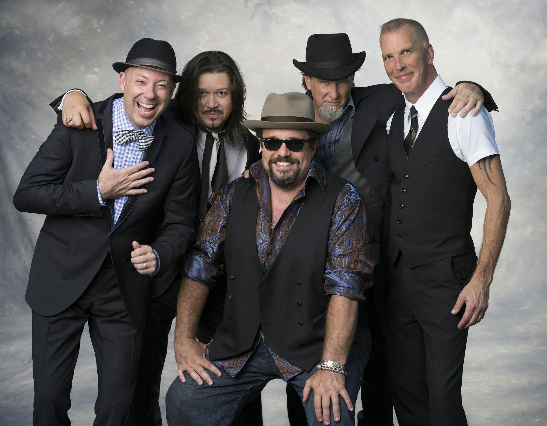 Photo by Mark Tucker; Publicity photo of the band the Mavericks. Raul Malo is center and sitting