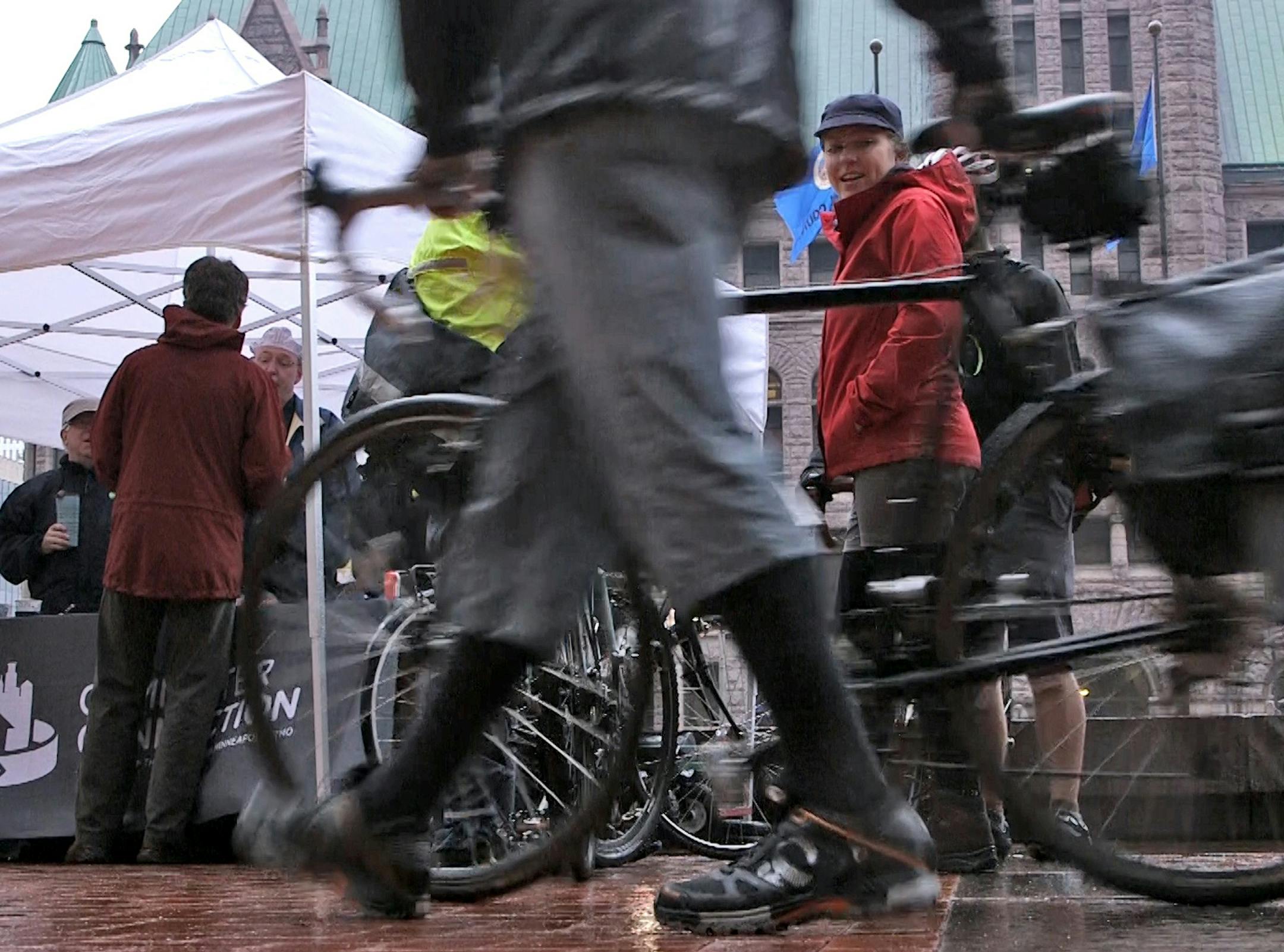 As part of the annual Bike to Work Day celebration at Hennepin County Government Center Plaza North in downtown Minneapolis, hosted in partnership with Hennepin County, cyclists were offered food, music, free bike repair, and a bicycle resource fair. It also rained. Photo: Matt Gillmer / Star Tribune Minneapolis, MN 05/08/14