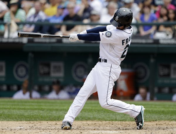 Seattle Mariners' Nick Franklin Nick Franklin connects on a three-run home run against the Minnesota Twins in the fourth inning of a baseball game, Su