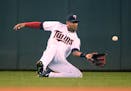 Minnesota Twins center fielder Aaron Hicks (32) made the catch off a hit by Kansas City Royals first baseman Eric Hosmer (35) in the top of the eighth
