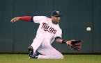 Minnesota Twins center fielder Aaron Hicks (32) made the catch off a hit by Kansas City Royals first baseman Eric Hosmer (35) in the top of the eighth
