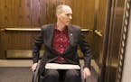 Rep. Rod Hamilton backs into an elevator in the State Office Building. ] LEILA NAVIDI &#xef; leila.navidi@startribune.com BACKGROUND INFORMATION: Rep.