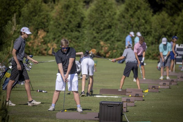 High School golfers took to the driving range during the Minnesota PGA Senior Showcase boys' high school golf tournament held at Bunker Hills, Tuesday