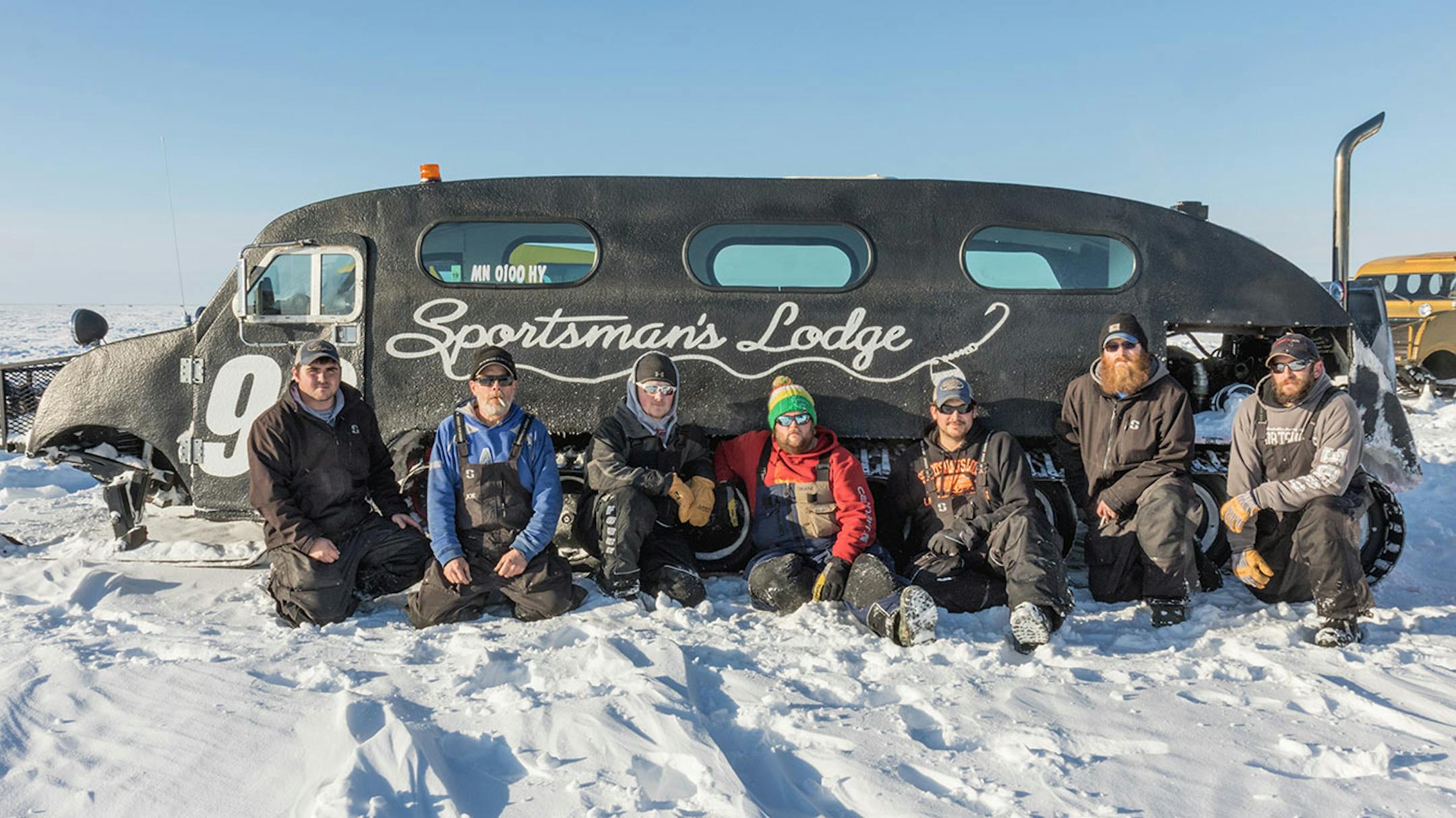 Ice guides at Sportsman's Lodge battle extreme cold, take care of fisher people and move ice houses using bombardiers to get around. From left to right: Matt McClure, Joe Anderson, Baihly Hontvet, Shane Burk, Mike Marquardt, Travis Campbell, Luke Eiynck.
