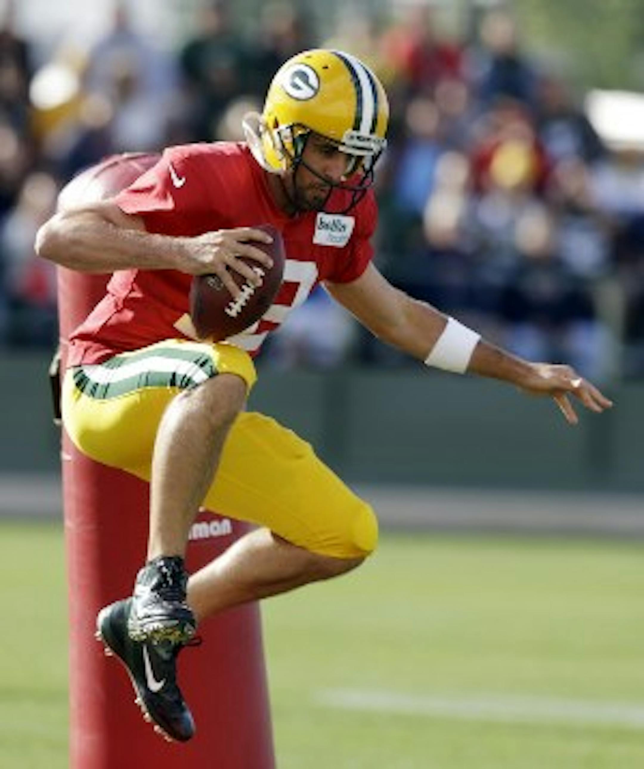 Aaron Rodgers creating the illusion of height?