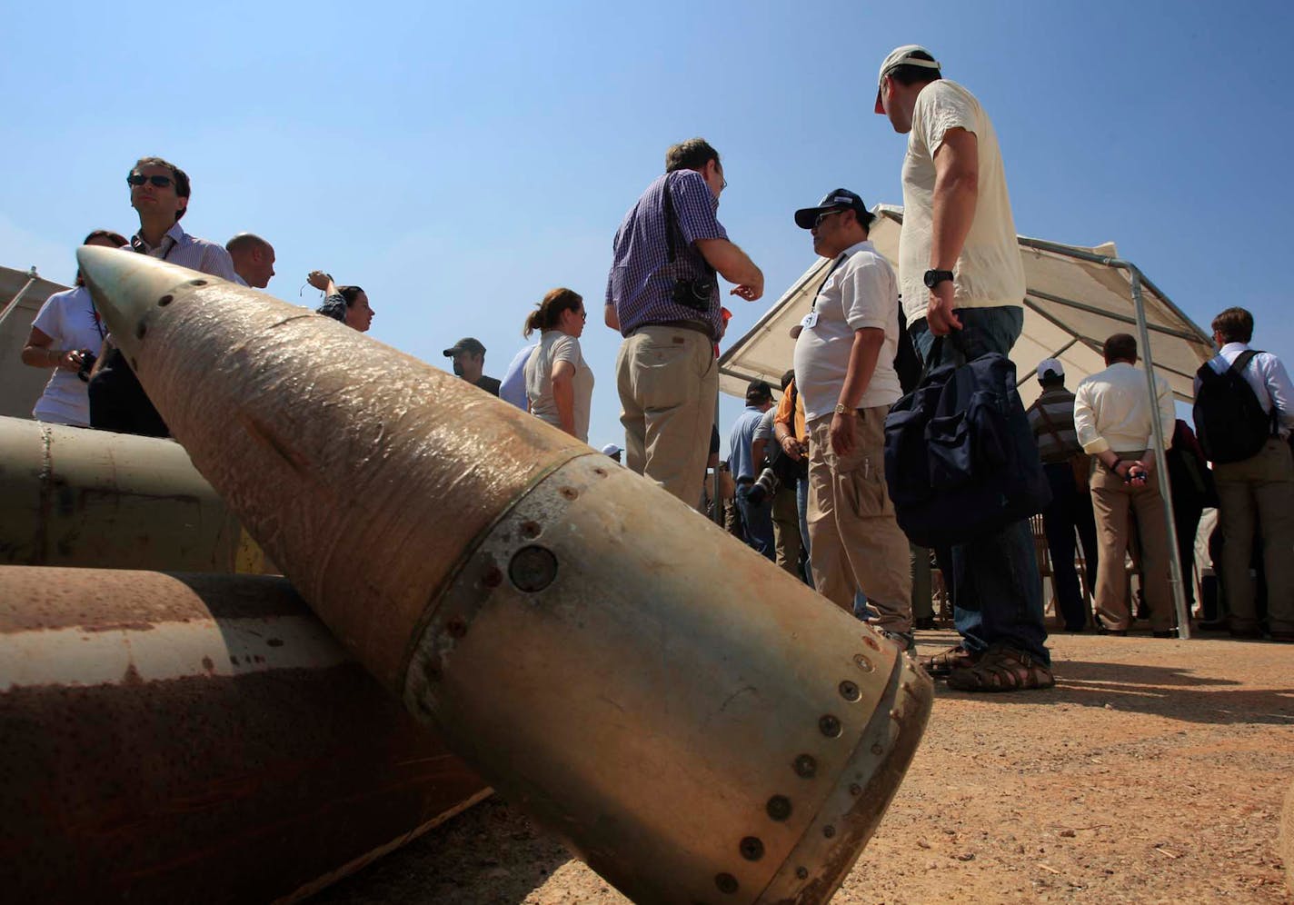 Cluster munitions stacked on the ground