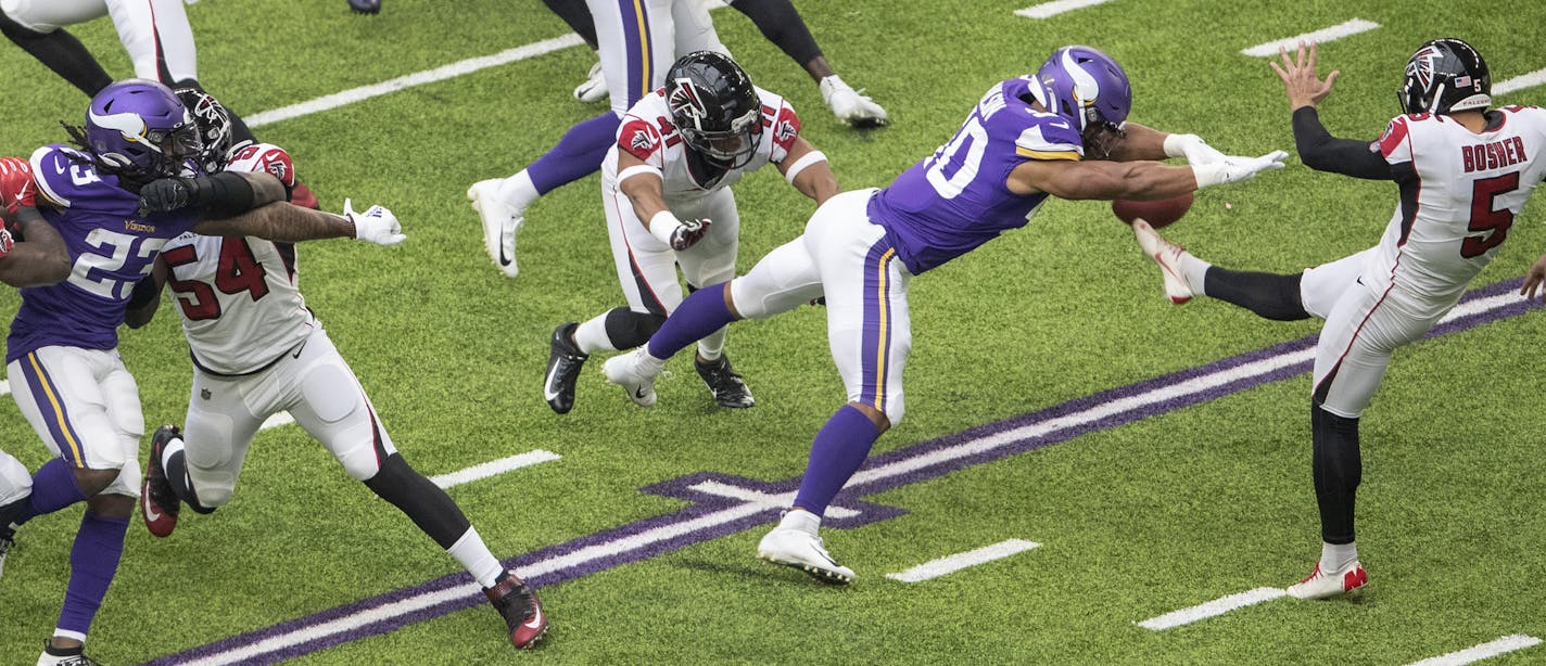 Minnesota Vikings' Eric Wilson (50) blocked a punt by Atlanta Falcons punter Matt Bosher (5) in the first quarter. ] CARLOS GONZALEZ &#x2022; cgonzalez@startribune.com &#x2013; Minneapolis, MN &#x2013; September 8, 2019, US Bank Stadium, NFL, Minnesota Vikings vs. Atlanta Falcons