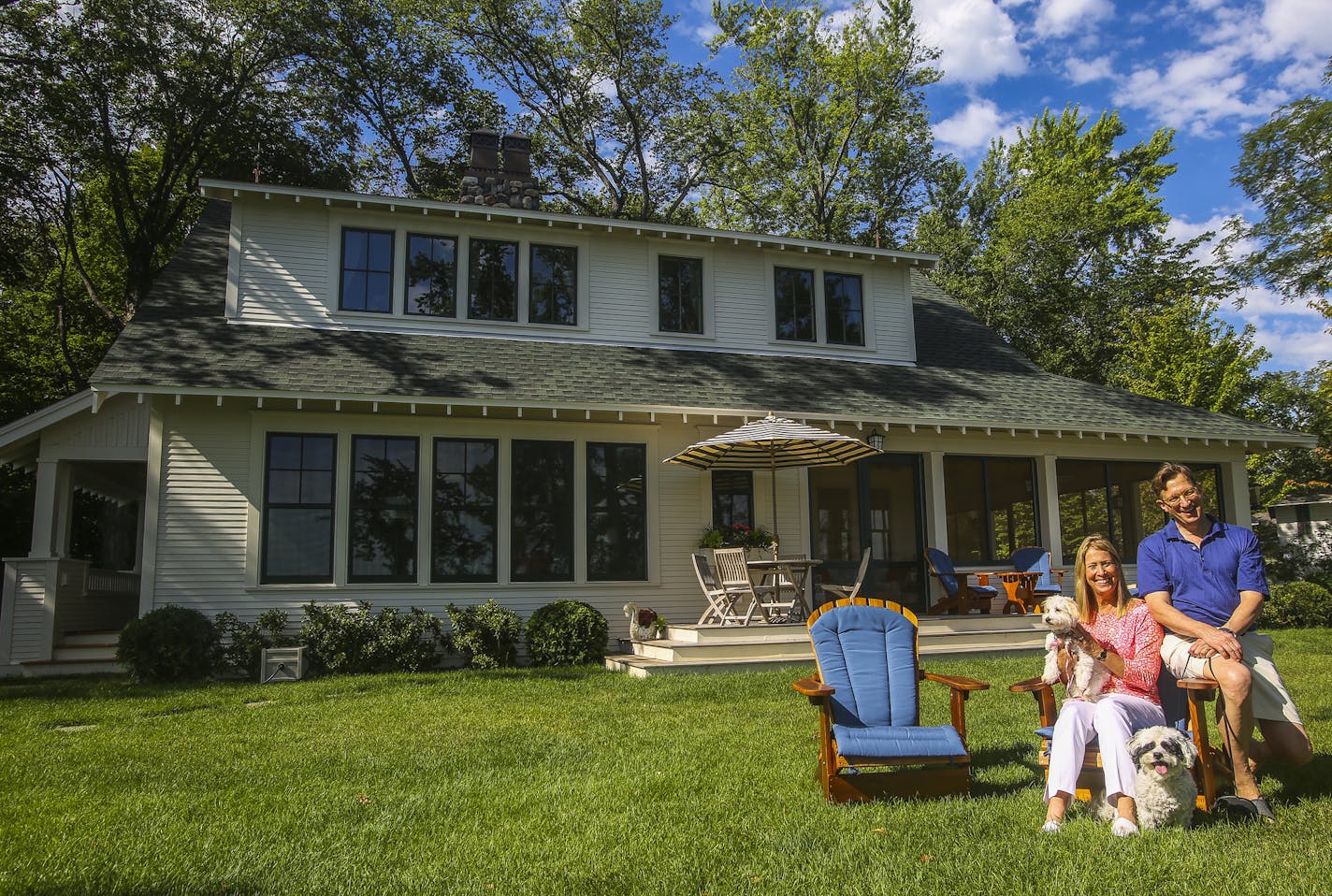 Leni and David Moore sat for a portrait outside their Crane Island cottage.