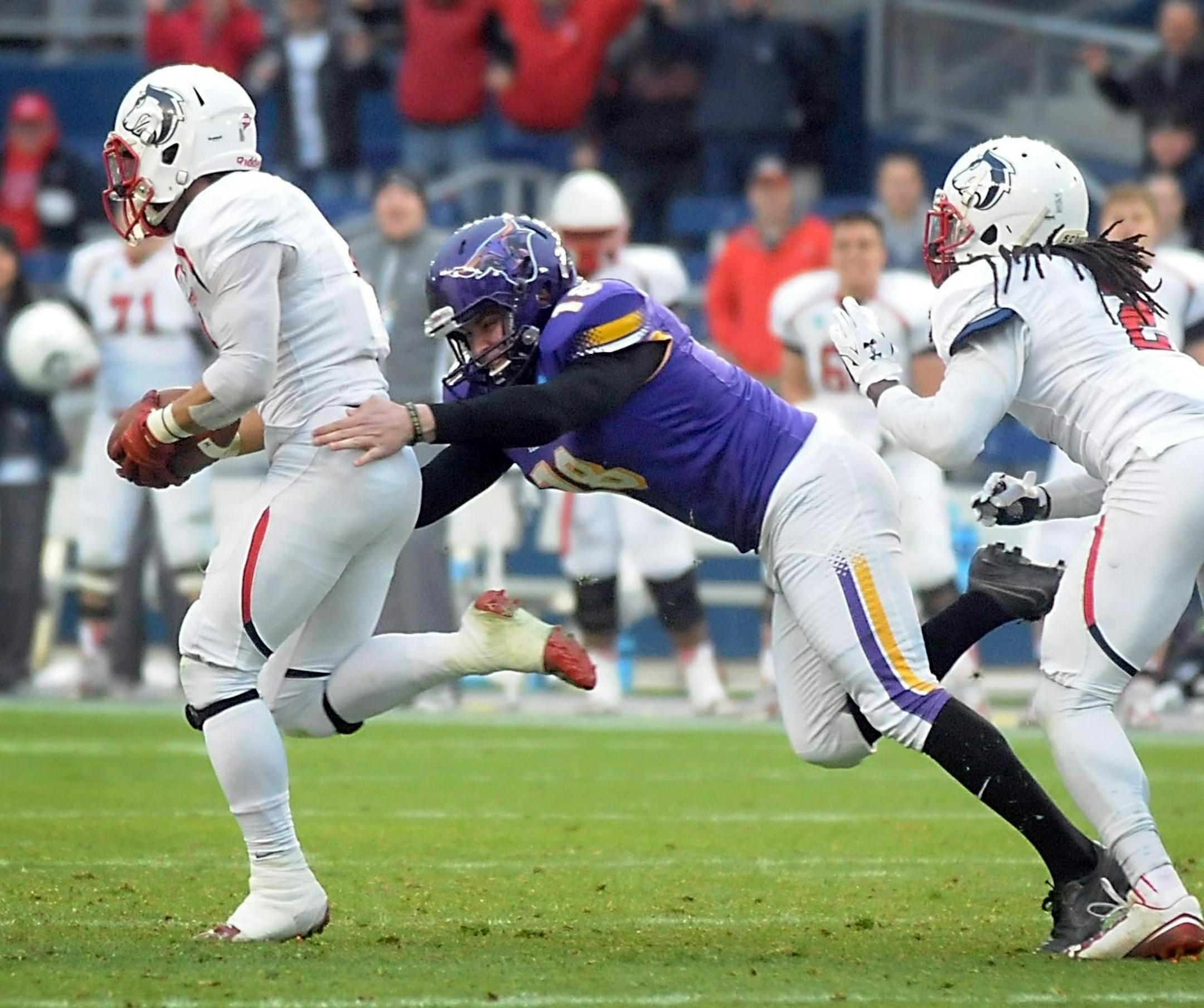 Minnesota State kicker Alden Haffar tackles Colorado State-Pueblo's Stephen Dickens after a blocked field goal attempt during the first half of the NCAA Division II national championship game Saturday at Sporting Park in Kansas City. Photo by Pat Christman
