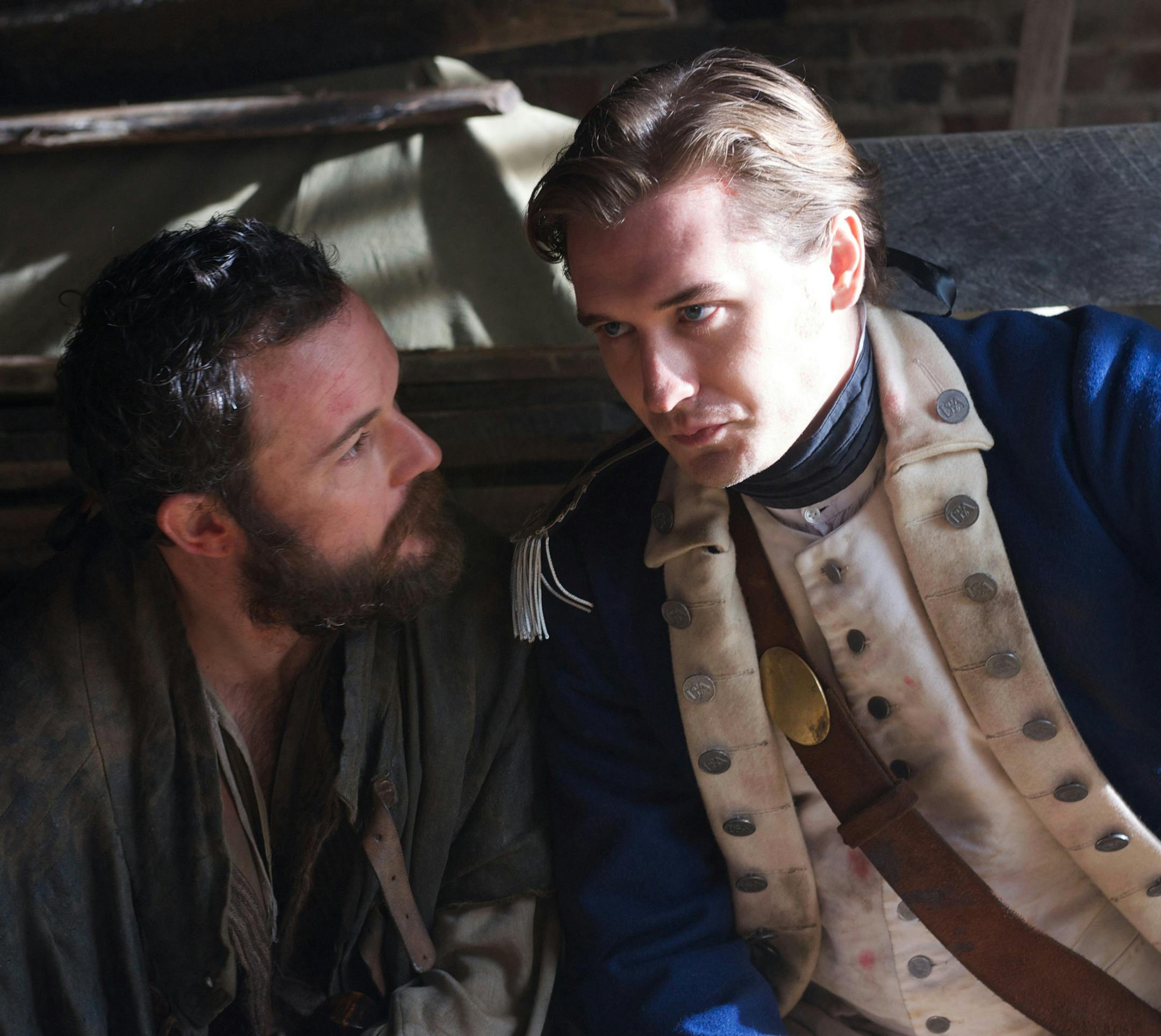 Daniel Henshall as Caleb Brewster and Seth Numrich as Ben Tallmadge - Turn _ Season 1, Episode 2 - Photo Credit: Antony Platt/AMC