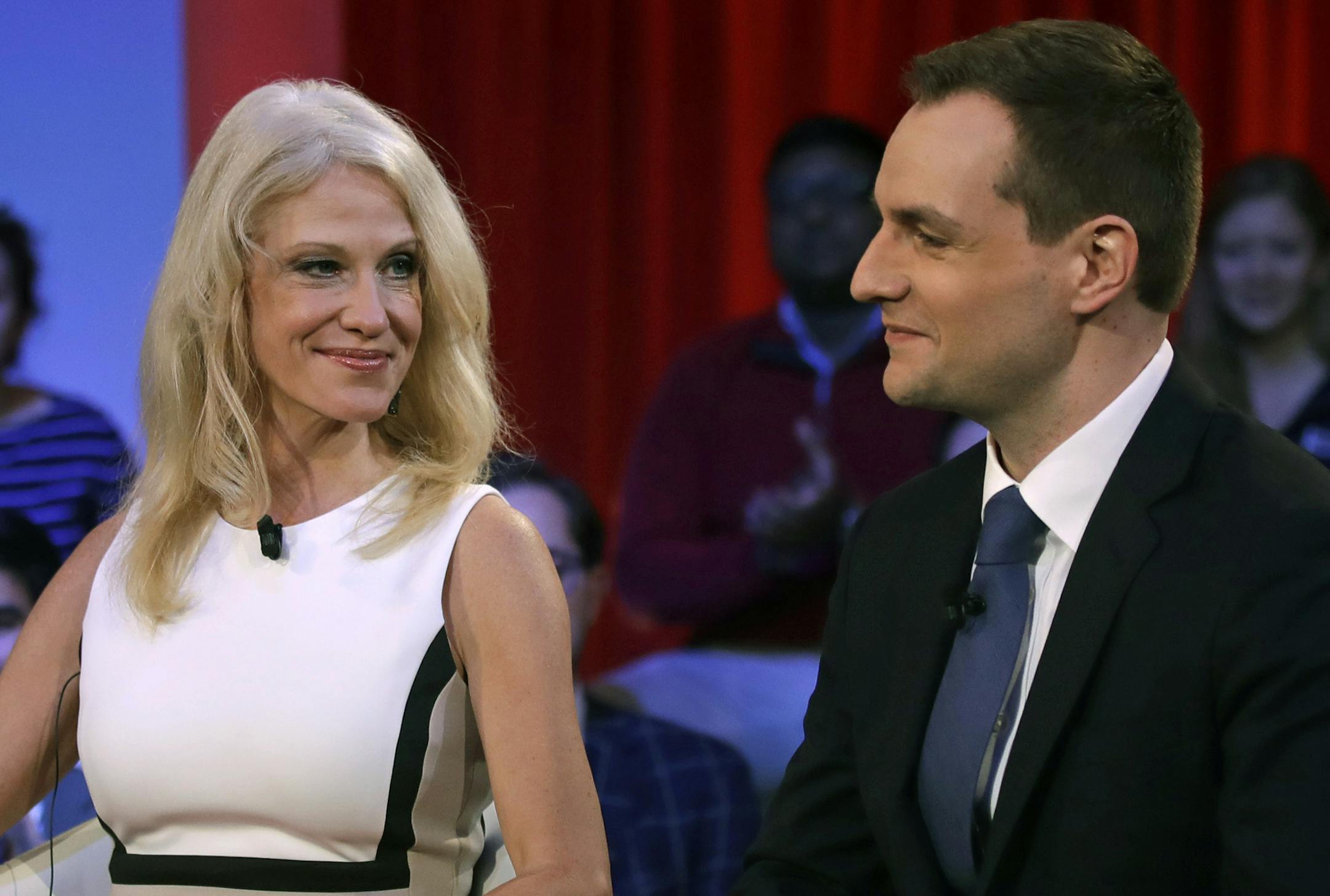 Kellyanne Conway, Trump-Pence campaign manager, left, looks towards Robby Mook, Clinton-Kaine campaign manager, prior to a forum at Harvard University's Kennedy School of Government in Cambridge, Mass., Thursday, Dec. 1, 2016. (AP Photo/Charles Krupa)