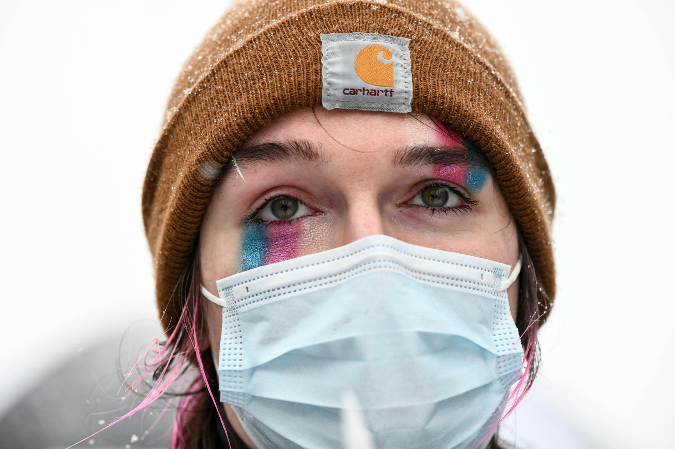 Natalia Garcia, of Minneapolis, listens to speakers during a rally Thursday, March 9, 2023 at the Lake Street/Midtown Transit Station in Minneapolis, Minn.. “Seeing all the bills and injustices towards Tran community last few years has been tough to witness,” said Garcia. “Our community is under attack.”

Community members gathered to celebrate and defend transgender people after a transgender woman was brutally assaulted last week near the Lake Street light rail station and amid a flurry of new legislation being proposed and passed throughout the country restricting access to gender affirming healthcare.     ] AARON LAVINSKY • aaron.lavinsky@startribune.com