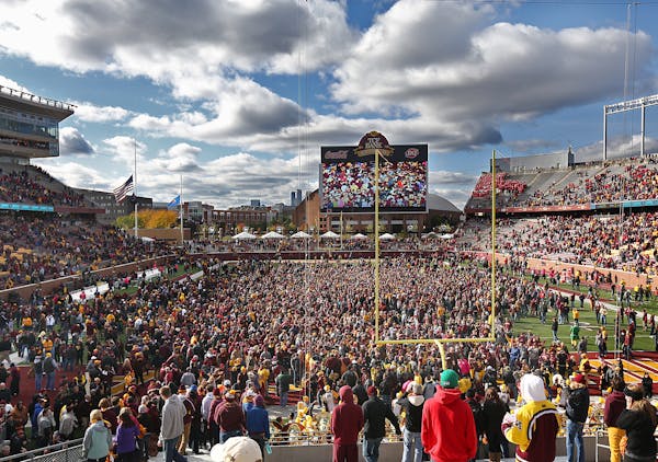 Fans stormed the field after the Gophers 34-23 victory over Nebraska.