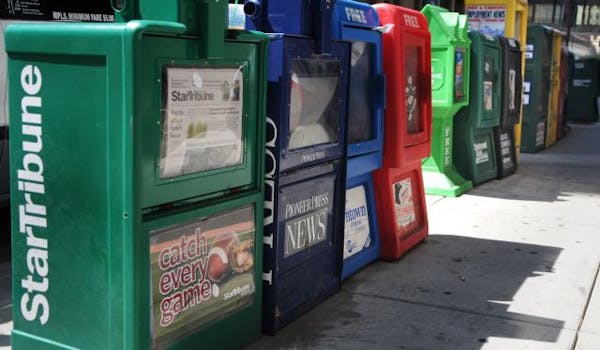 Newspaper boxes.