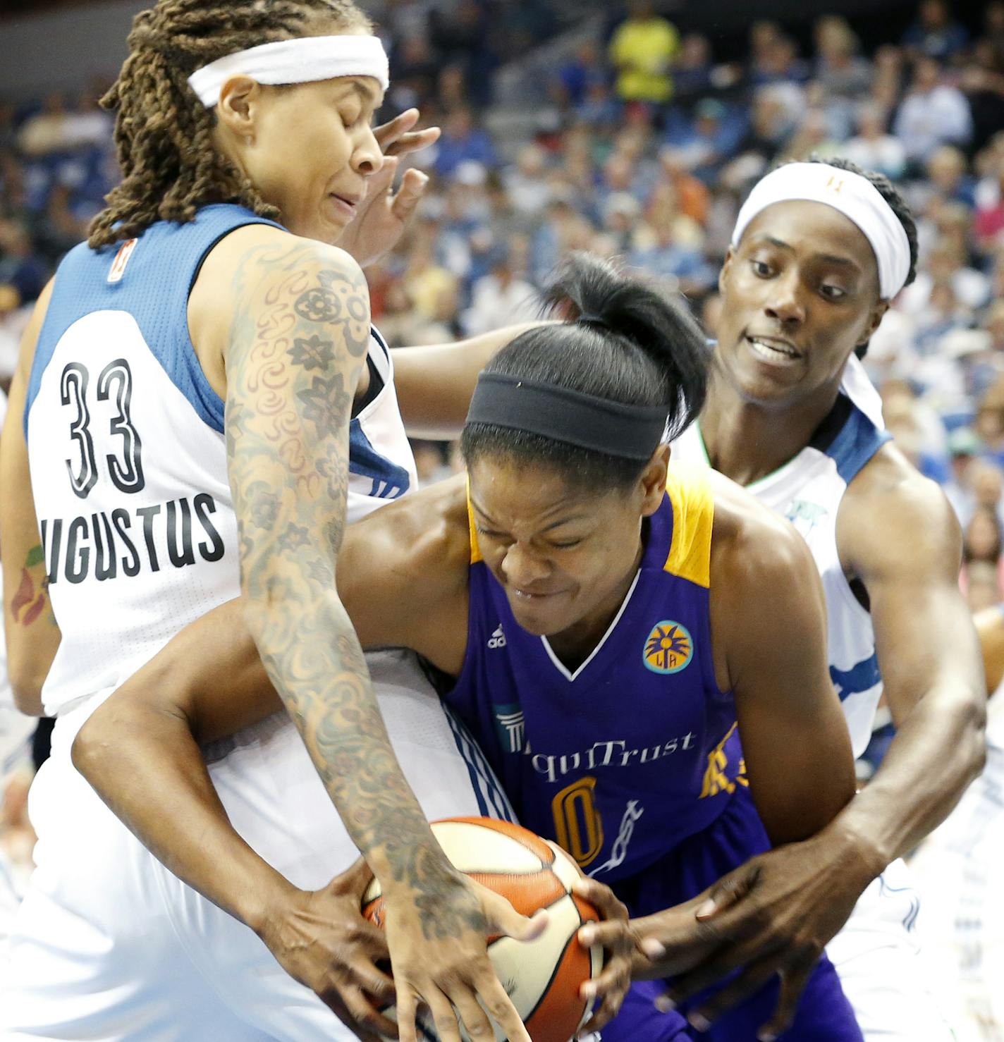 Seimone Augustus (33) and Sylvia Fowles (34) defended Alana Beard (0) in the first quarter. ] CARLOS GONZALEZ &#xef; cgonzalez@startribune.com - September 22, 2015, Minneapolis, MN, Target Center, WNBA, Minnesota Lynx vs. Los Angeles Sparks, Game 3 of first round WNBA playoff