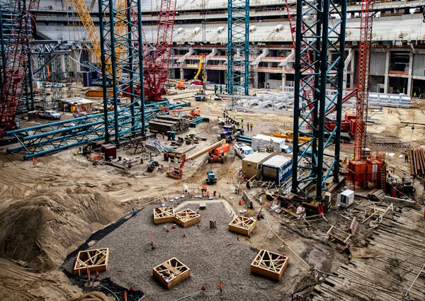 A dispute erupted this week over possible cost overruns at the Vikings new stadium, which is now more than 65 percent complete.