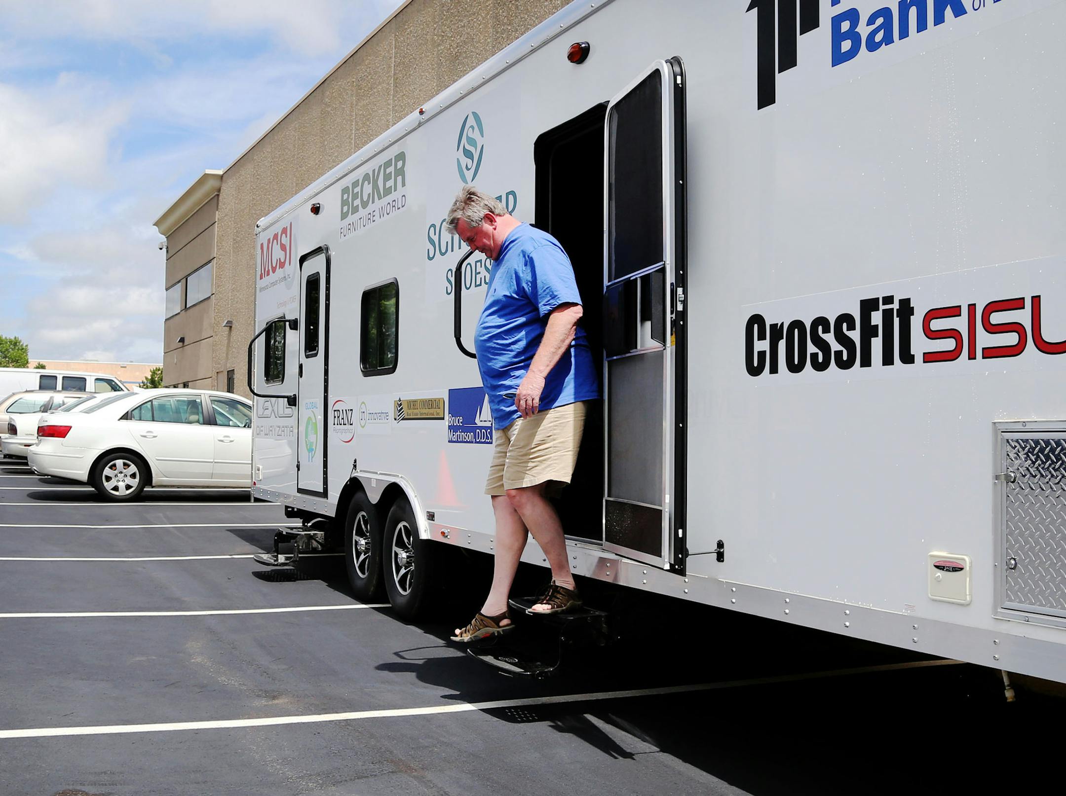 Ron Green, a U.S. Marine Veteran, who served during the Vietnam War era, heads for home after getting treatment at Doug Huesby's non-profit, PainFree Patriots in the Living Word Christian Center parking lot Tuesday, July 28, 2015, in Brooklyn Park, MN. Green, who also has type II diabetes, said he was in tremendous pain with feet that were bleeding in June when he began treatment but that now his pain has all but gone away. "It's totally life changing," Green said, adding that he stopped taking