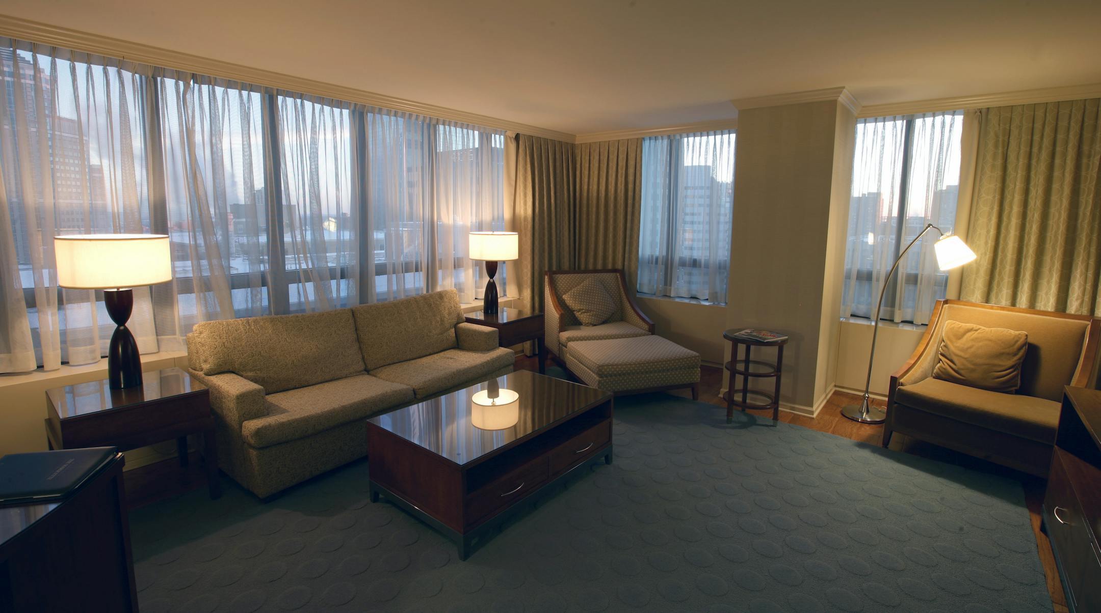 The city is a backdrop in the sitting room of a suite at the Marquette. At the nearby Windows on Minnesota, guests can enjoy Sunday brunch with a view.