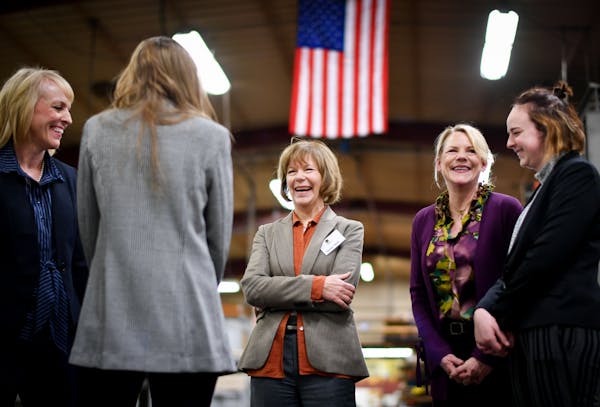 Sen. Tina Smith talked with Wyoming Machine Inc. Co-Presidents Traci and Lori Tapani and Traci's daughters Ailie and Maija Olson. Smith made her first