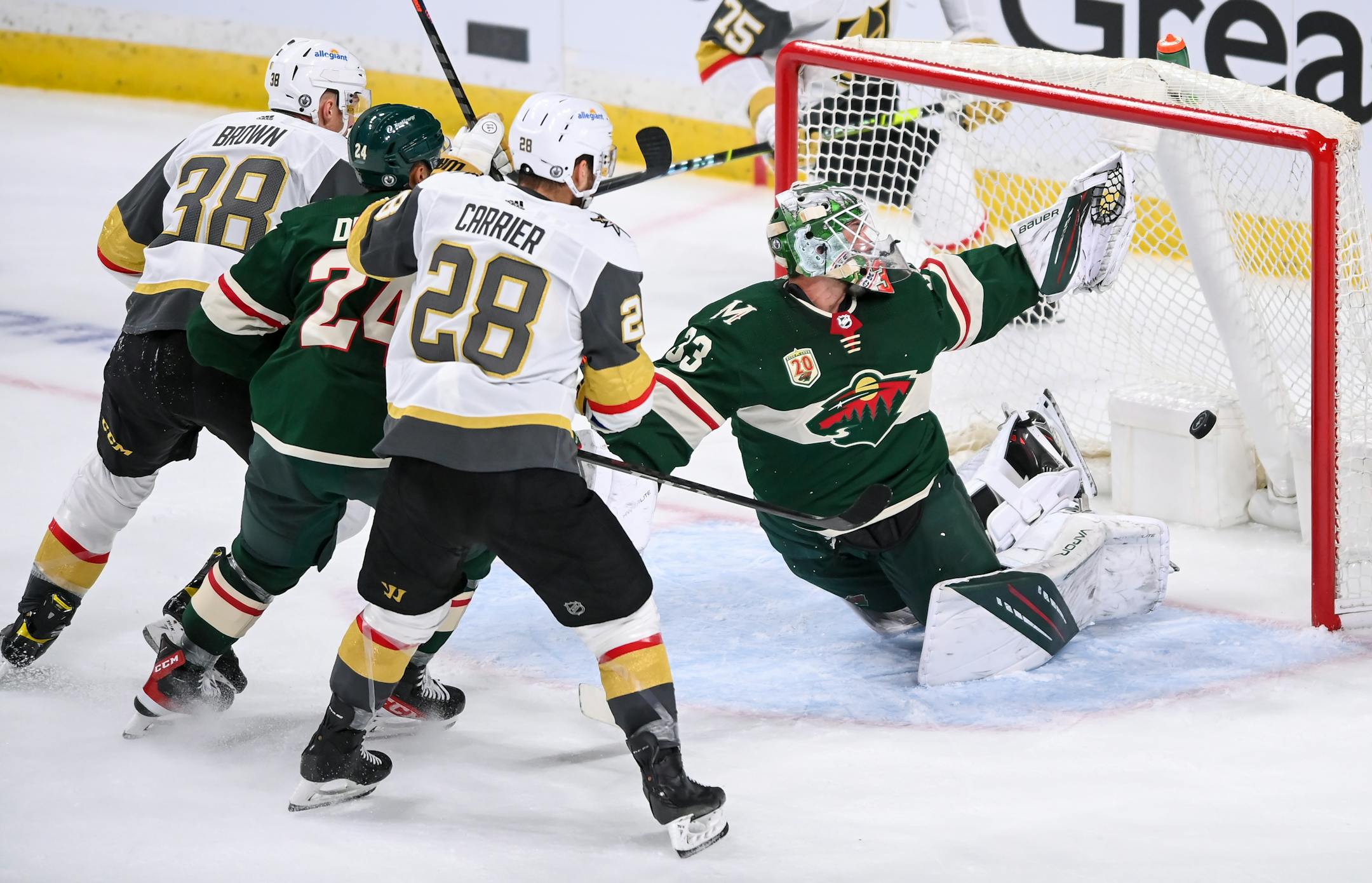 A shot by Vegas Golden Knights center Patrick Brown (38) went past the glove of Minnesota Wild goaltender Cam Talbot (33) for the game-tying goal in the second period.