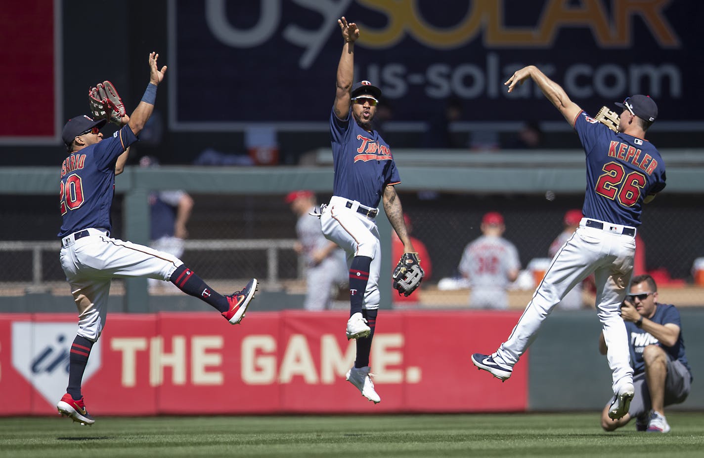 Twins left fielder Eddie Rosario, left, center fielder Byron Buxton, center, and right fielder Max Kepler celebrate a 8-7 win over the Los Angeles Angels at Target Field, Wednesday, May 15, 2019 in Minneapolis, MN. ] ELIZABETH FLORES &#x2022; liz.flores@startribune.com