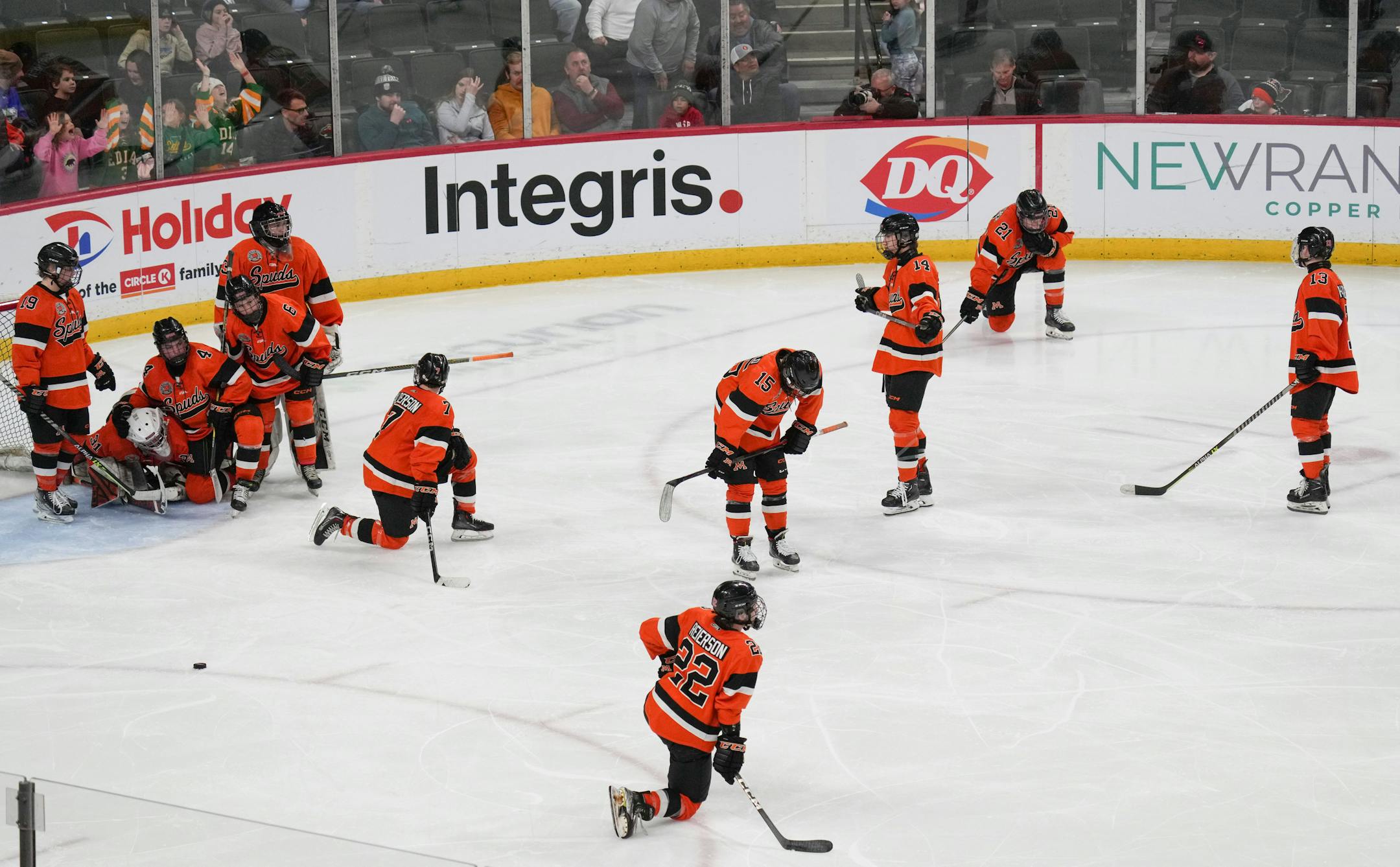 Morehead Spuds players were dejected after Edina's win against them in double overtime.