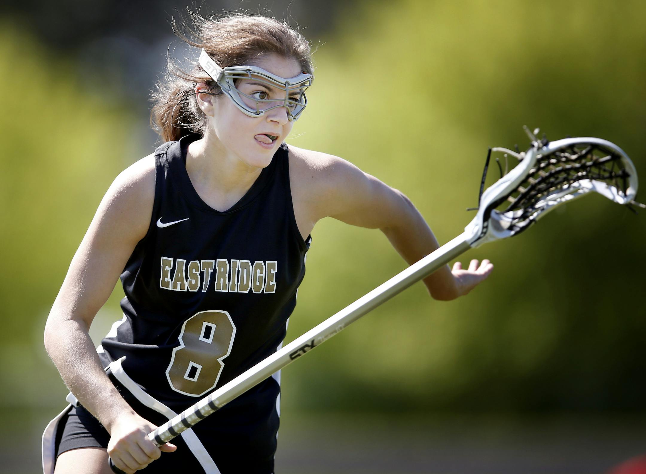 East Ridge lacrosse player Jessica Hammer (8). Her sister, Samantha Hammer also plays on the team. ] CARLOS GONZALEZ cgonzalez@startribune.com - May 22, 2014, Forest Lake, Minn., Century Jr. High School, Wash County zone sports feature on East Ridge girls' lacrosse, including a number of sisters. The Hammer sisters (twins) are both seniors and are both going to play Div. 1 college lacrosse at the same school. twins Jessica Hammer - #8; Samantha Hammer - #2