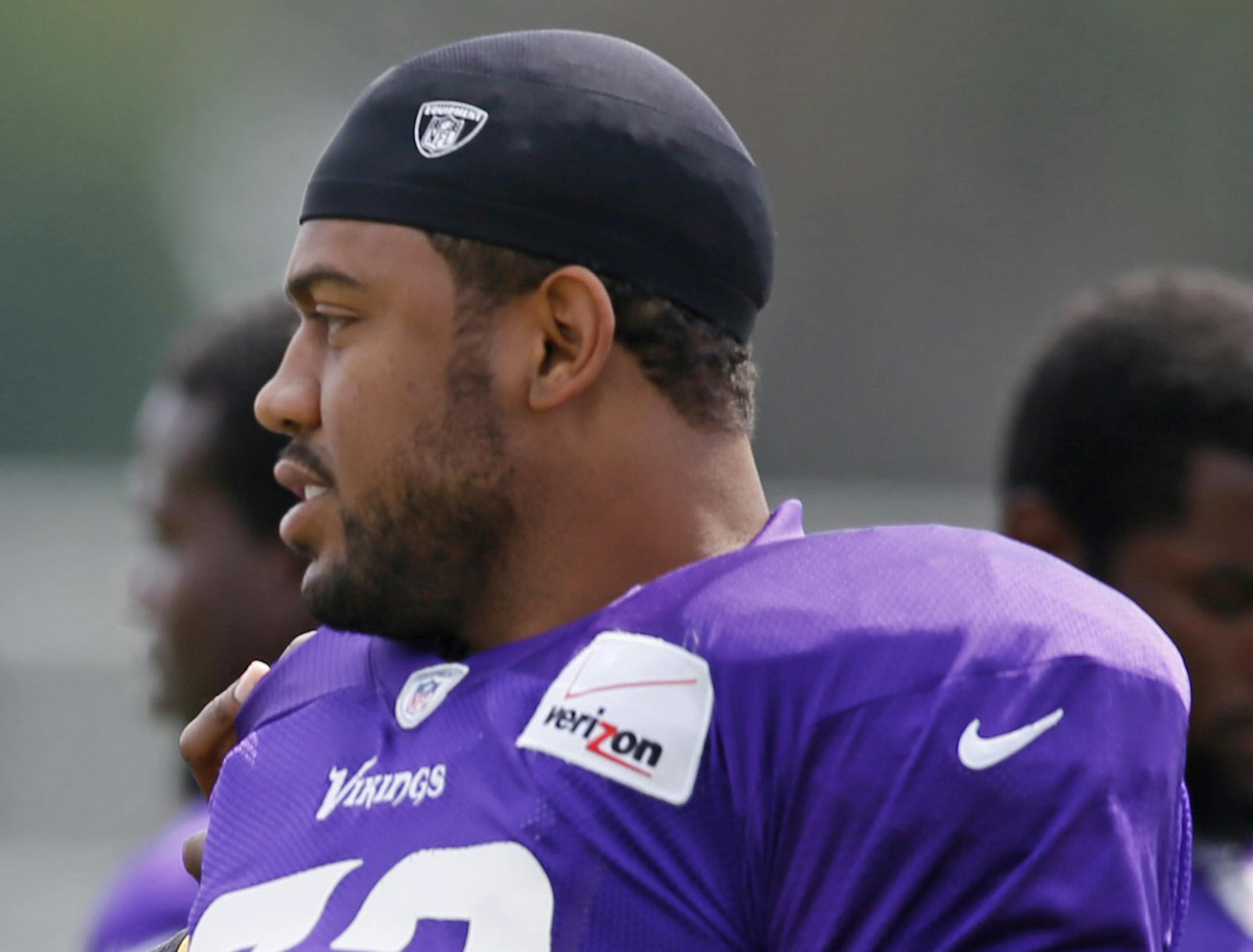 Vikings intern Kenechi Udeze talked with Kevin Williams during Vikings practice at Minnesota State University Mankato Wednesday Aug 14 ,2013 in Mankato, MN. ] JERRY HOLT ‚Ä¢ jerry.holt@startribune.com