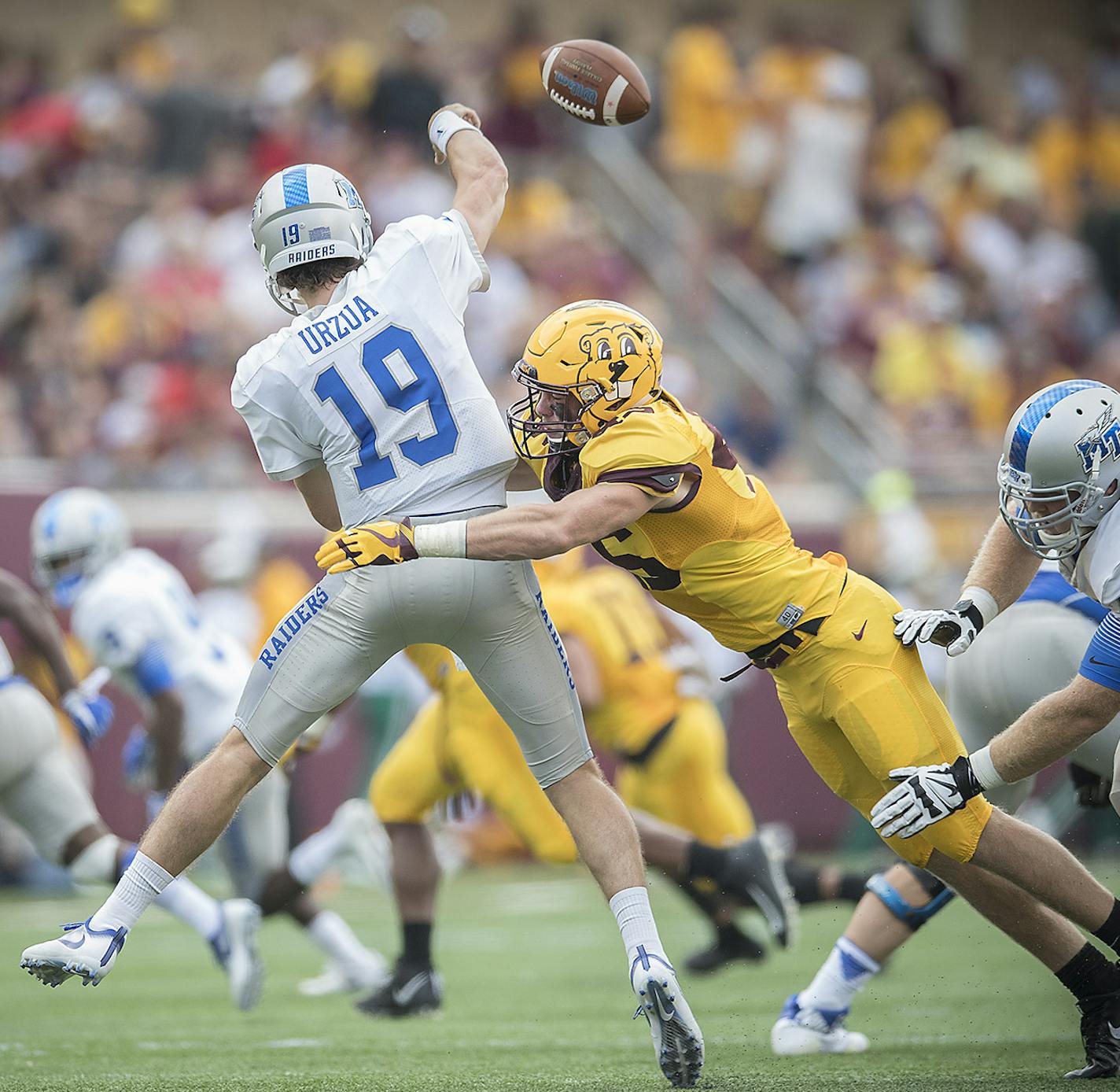 Minnesota's linebacker Carter Coughlin tackled Middle Tennessee's quarterback John Urzua during the second quarter as the Gophers took on Middle Tennessee at TCF Bank Stadium, Saturday, September 16, 2017 in Minneapolis, MN. ] ELIZABETH FLORES &#xef; liz.flores@startribune.com